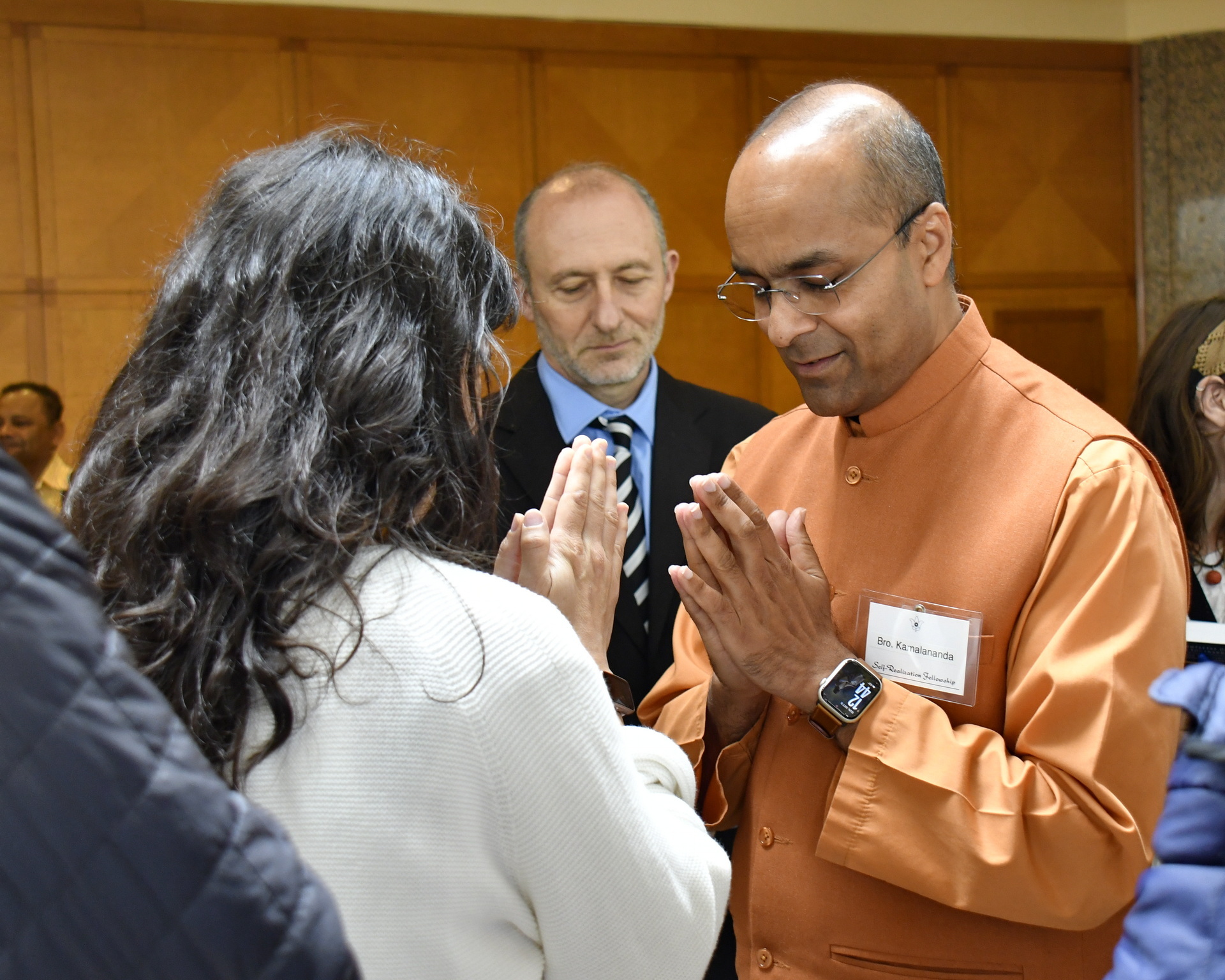 Brother Kamalananda greets a devotee.