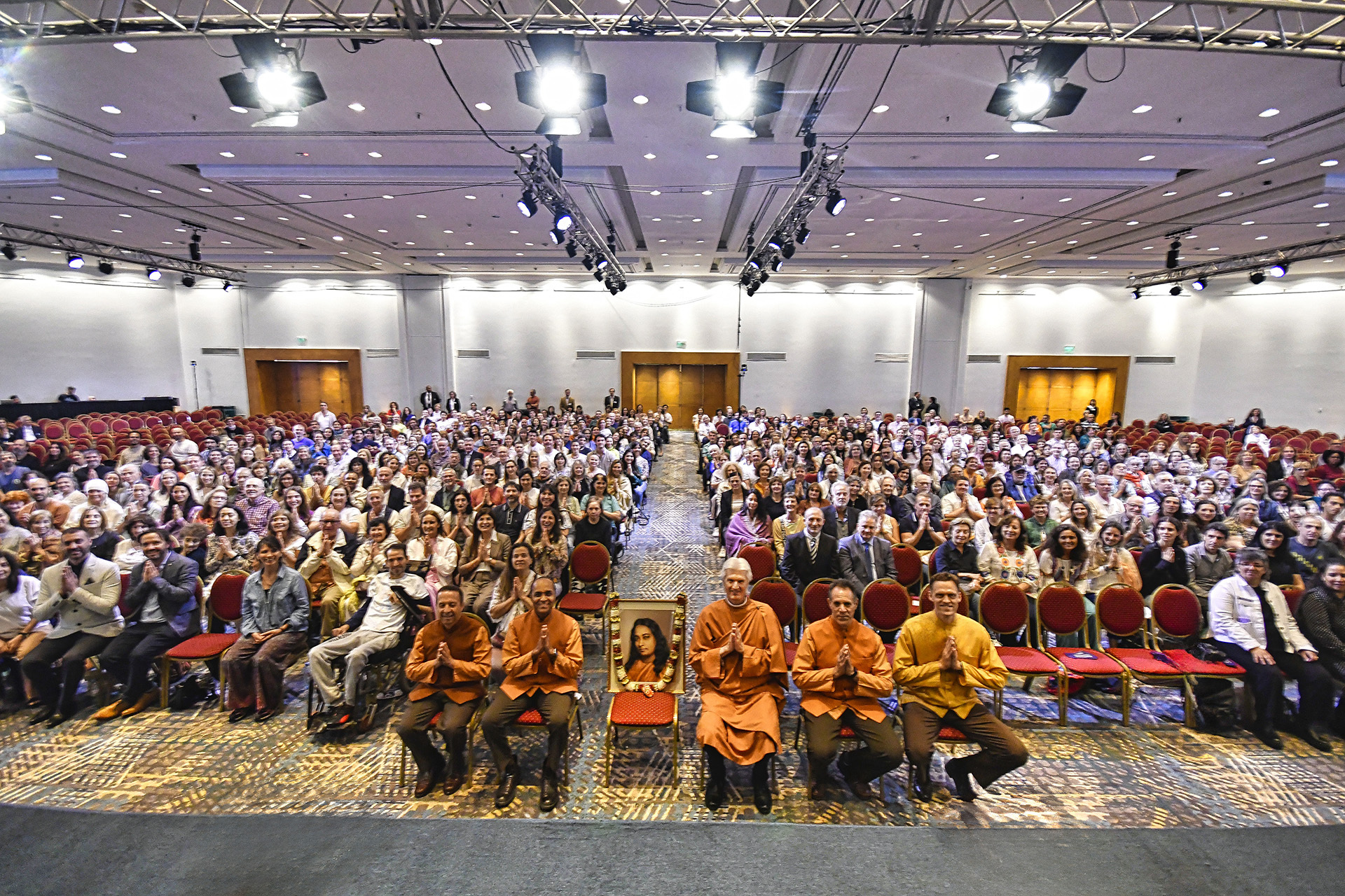 Group shot of Brother Chidananda, the monks, and participants.