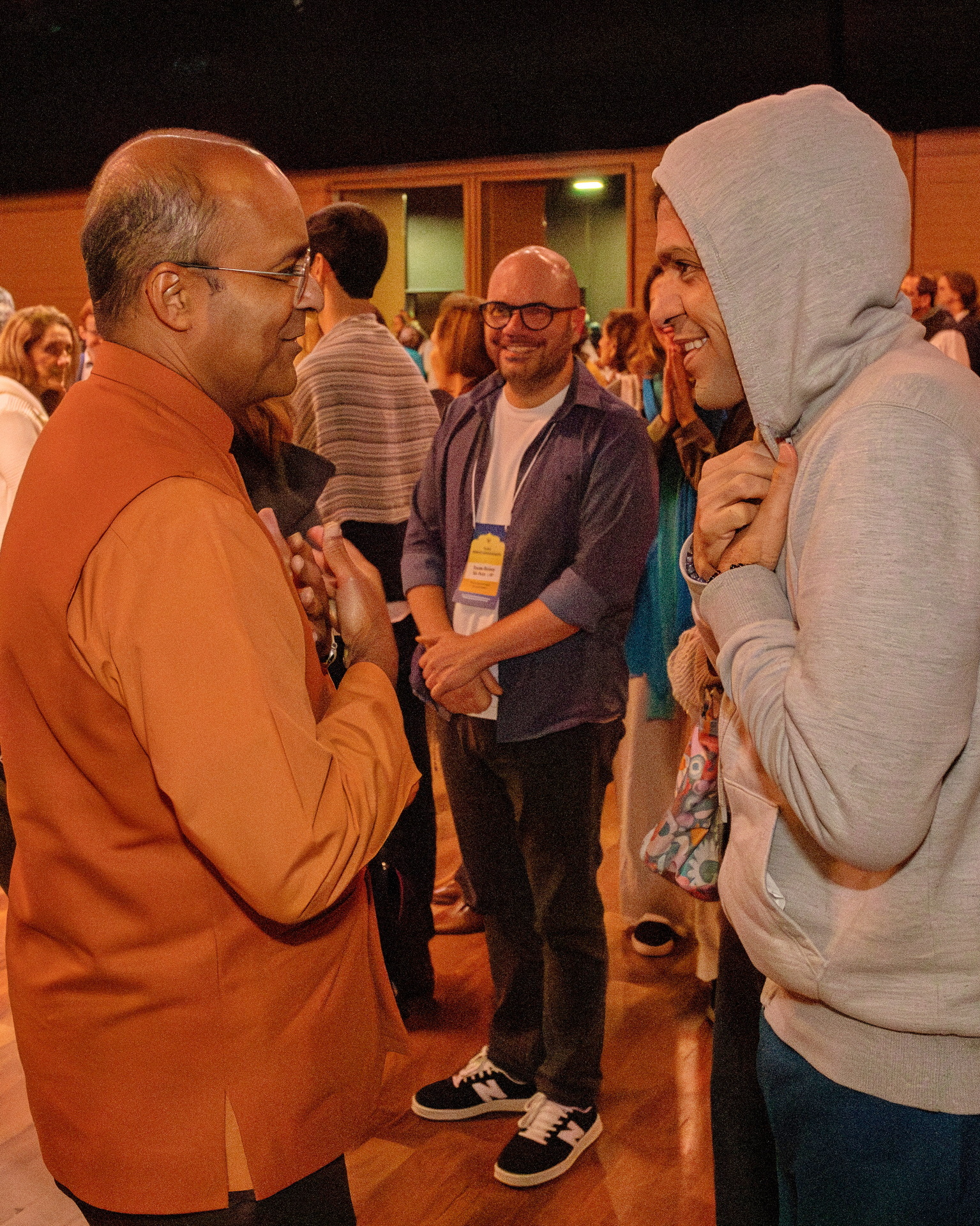 Brother Kamalananda greets members at the close of the program.