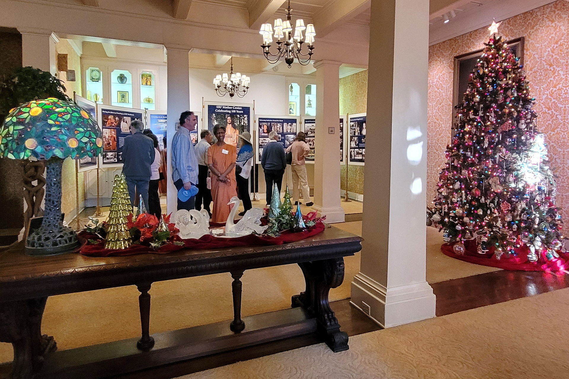 Visitors enjoyed viewing a Centennial Commemoration exhibit in the main hall of the International Headquarters Building.