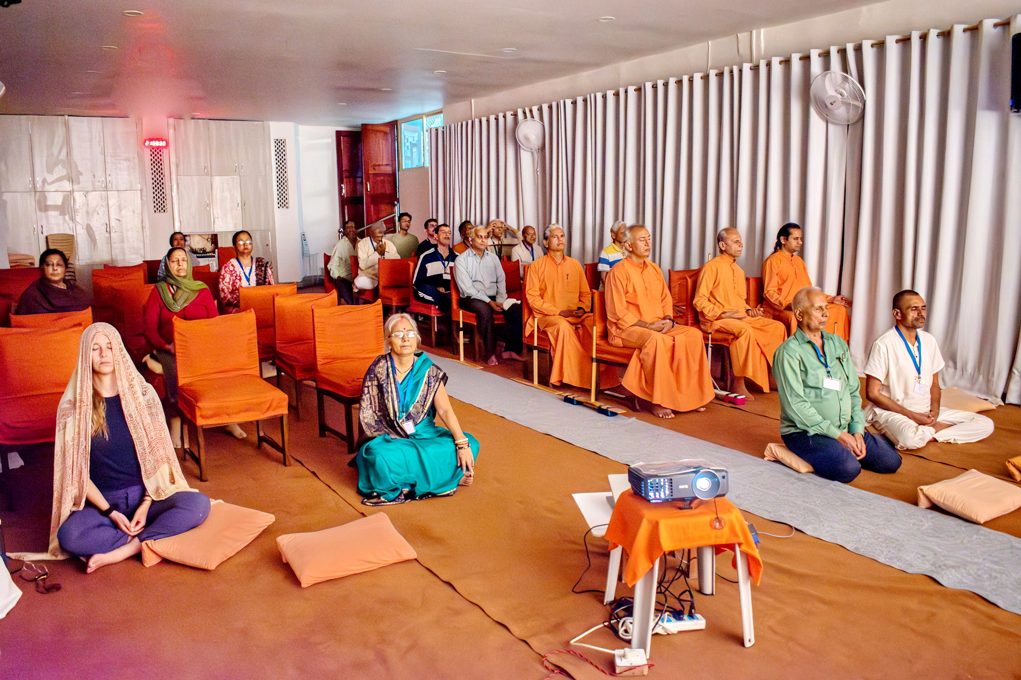 YSS monks and devotees at the Dwarahat Ashram participate in Convocation online.