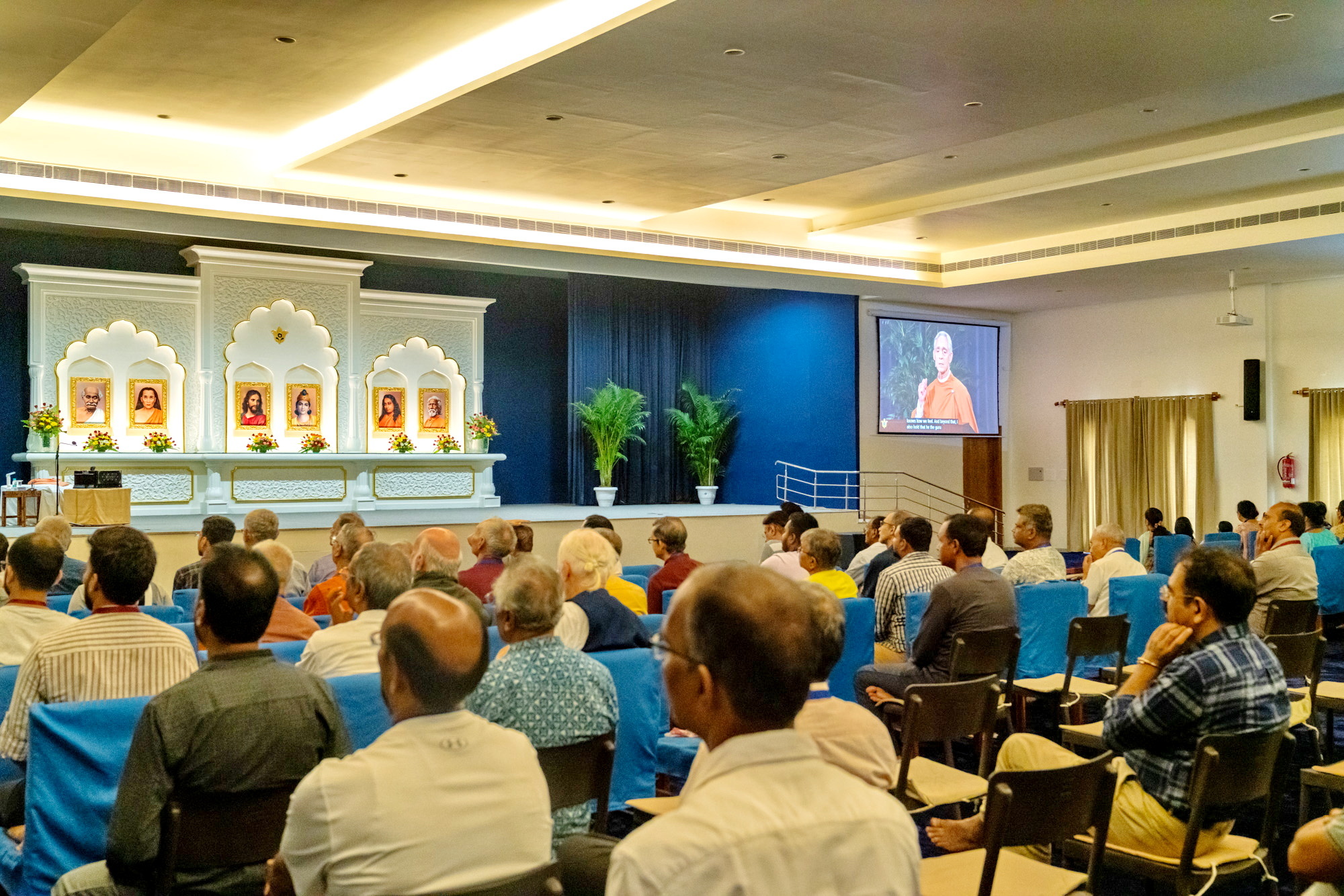 At the YSS Ranchi Ashram, participants view a class streamed from the Bonaventure Hotel.
