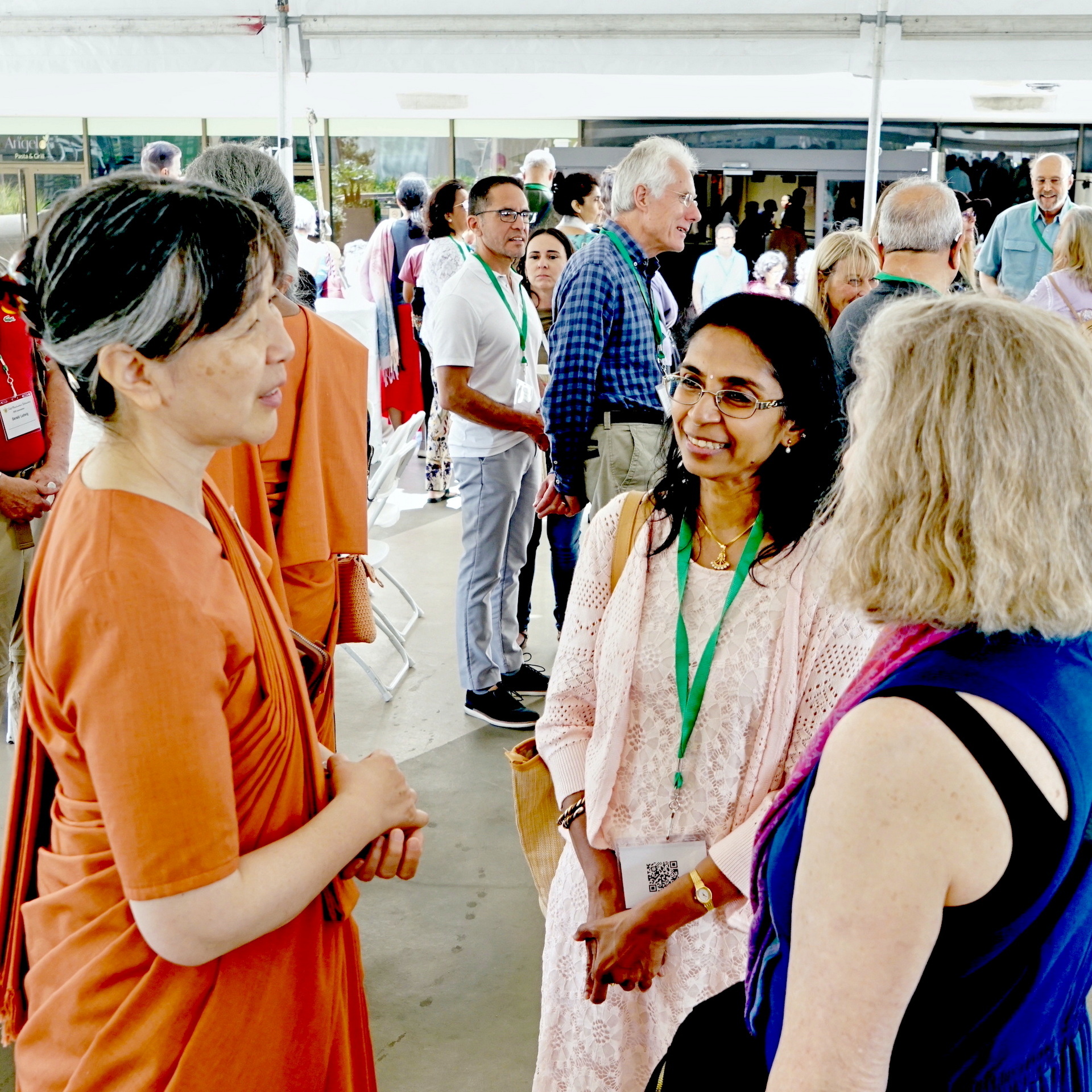 Sister Shankari converses with devotees.