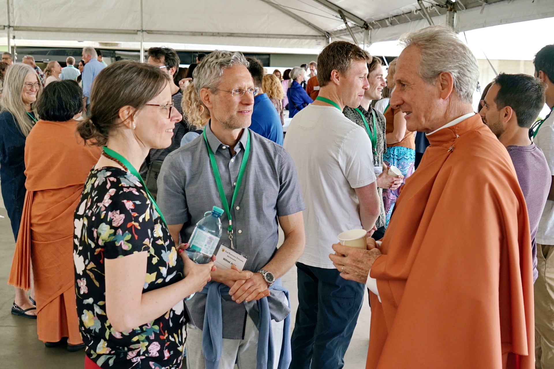 Brother Nikhilananda speaks with attendees at the Open House.