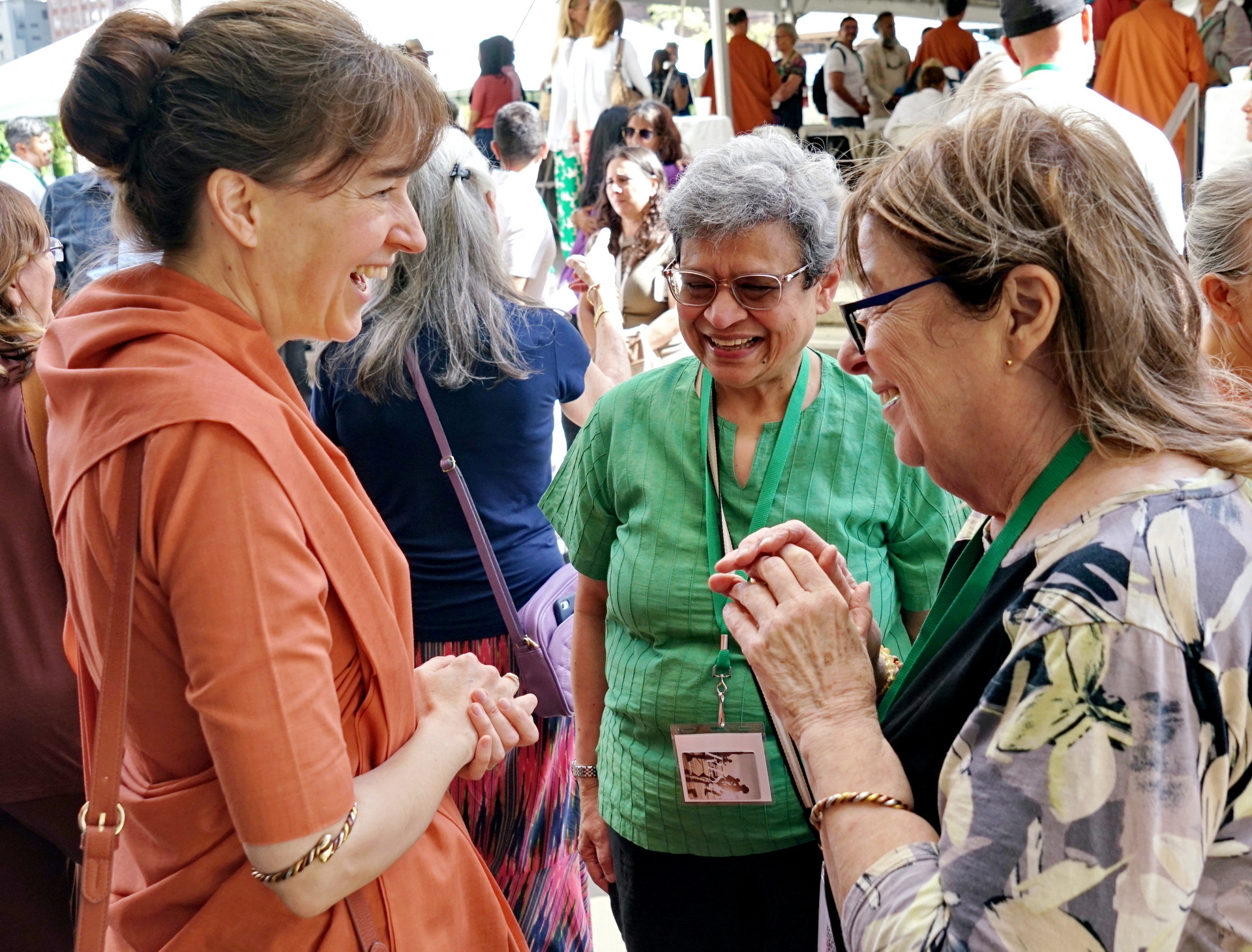 Sister Chetana converses with members.