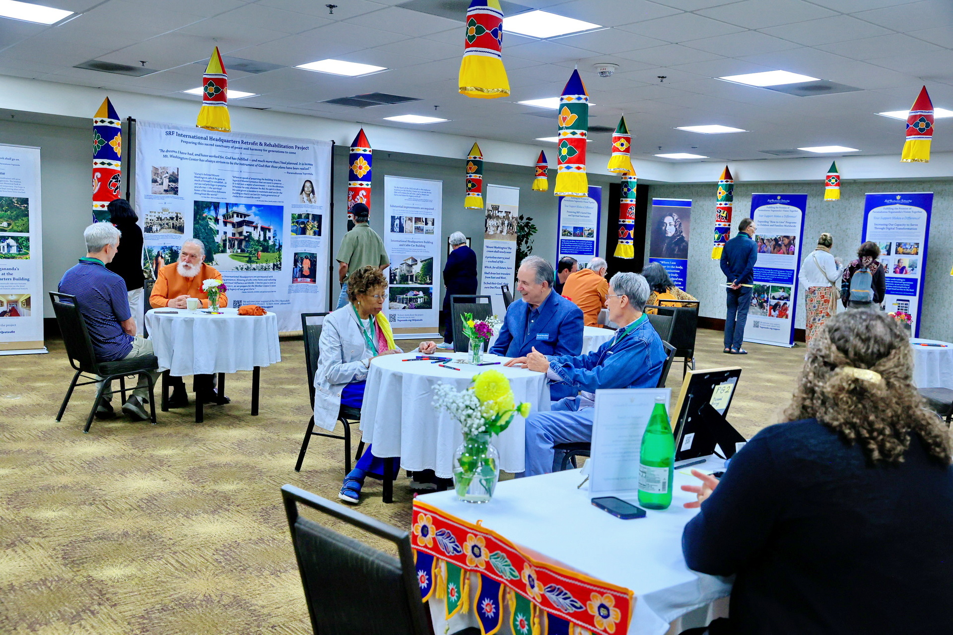 A special photo display was organized by the Department of Philanthropic Planning highlighting the growth of the SRF work.
