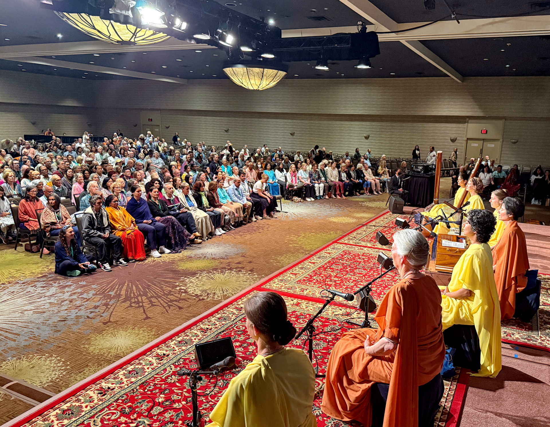The SRF nuns' kirtan group leads devotional chanting.