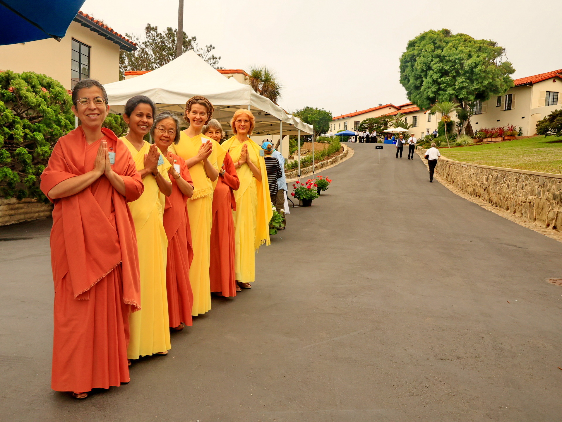 SRF nuns greet devotees on their way to the Encinitas Hermitage during the Encinitas pilgrimage tour held on Sunday, June 29.