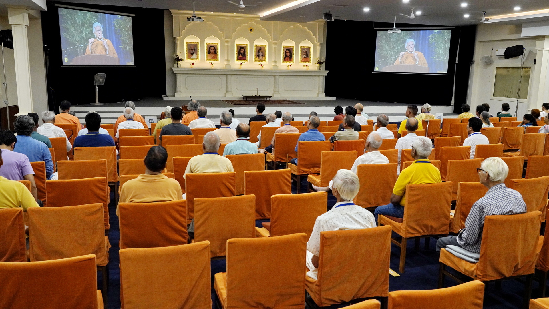 Devotees at the YSS Noida Ashram join Brother Chidananda's closing class.