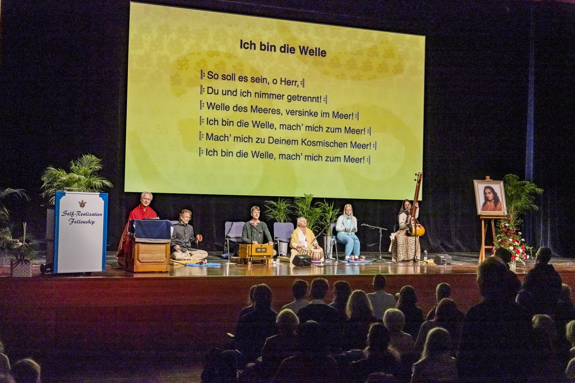 During kirtan chanting, participants interiorize with Paramahansaji's chants.