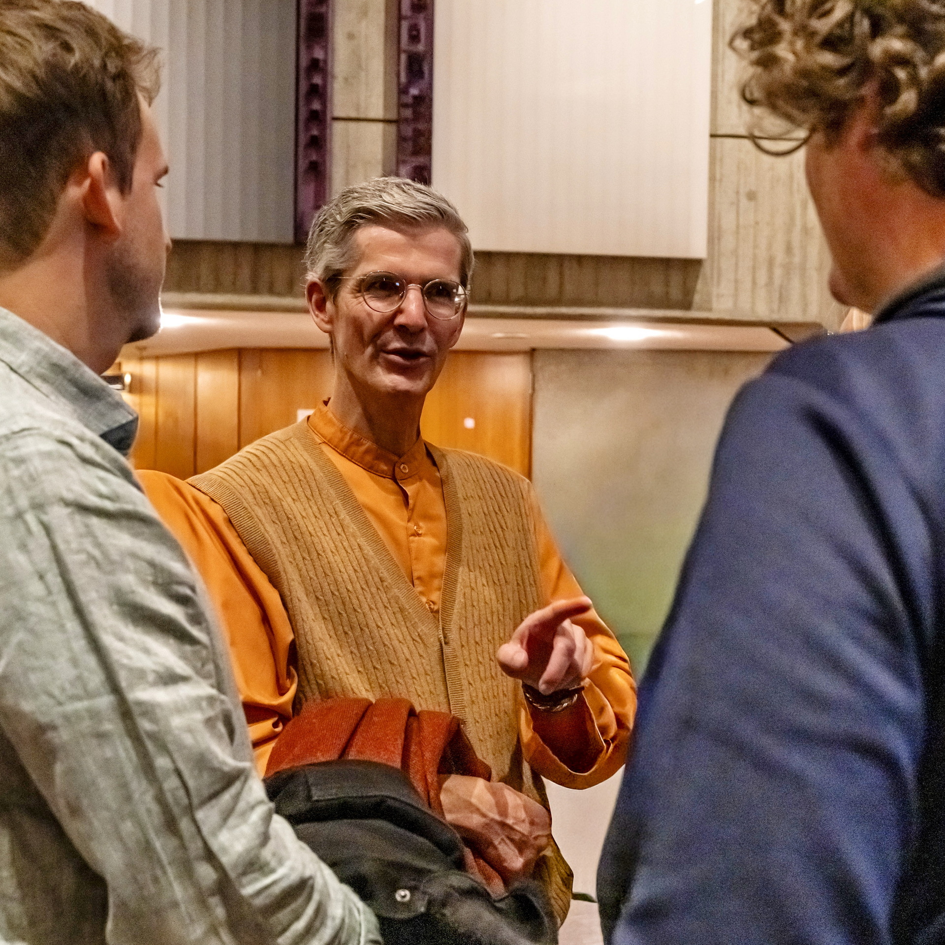 Participants speak with Brother Vimalananda.