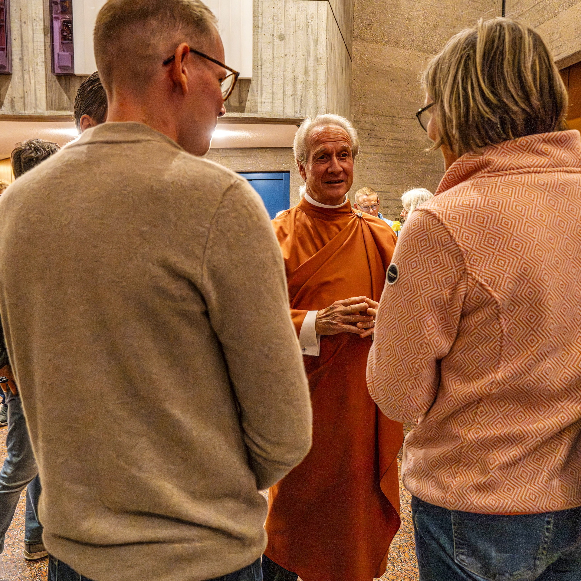 Brother Nikhilananda greets members after a class.