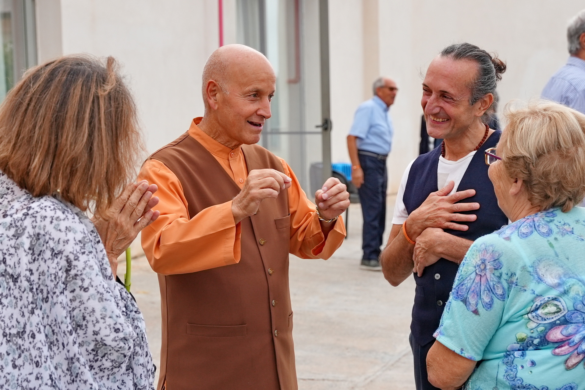 Brother Vajrananda speaks with attendees.