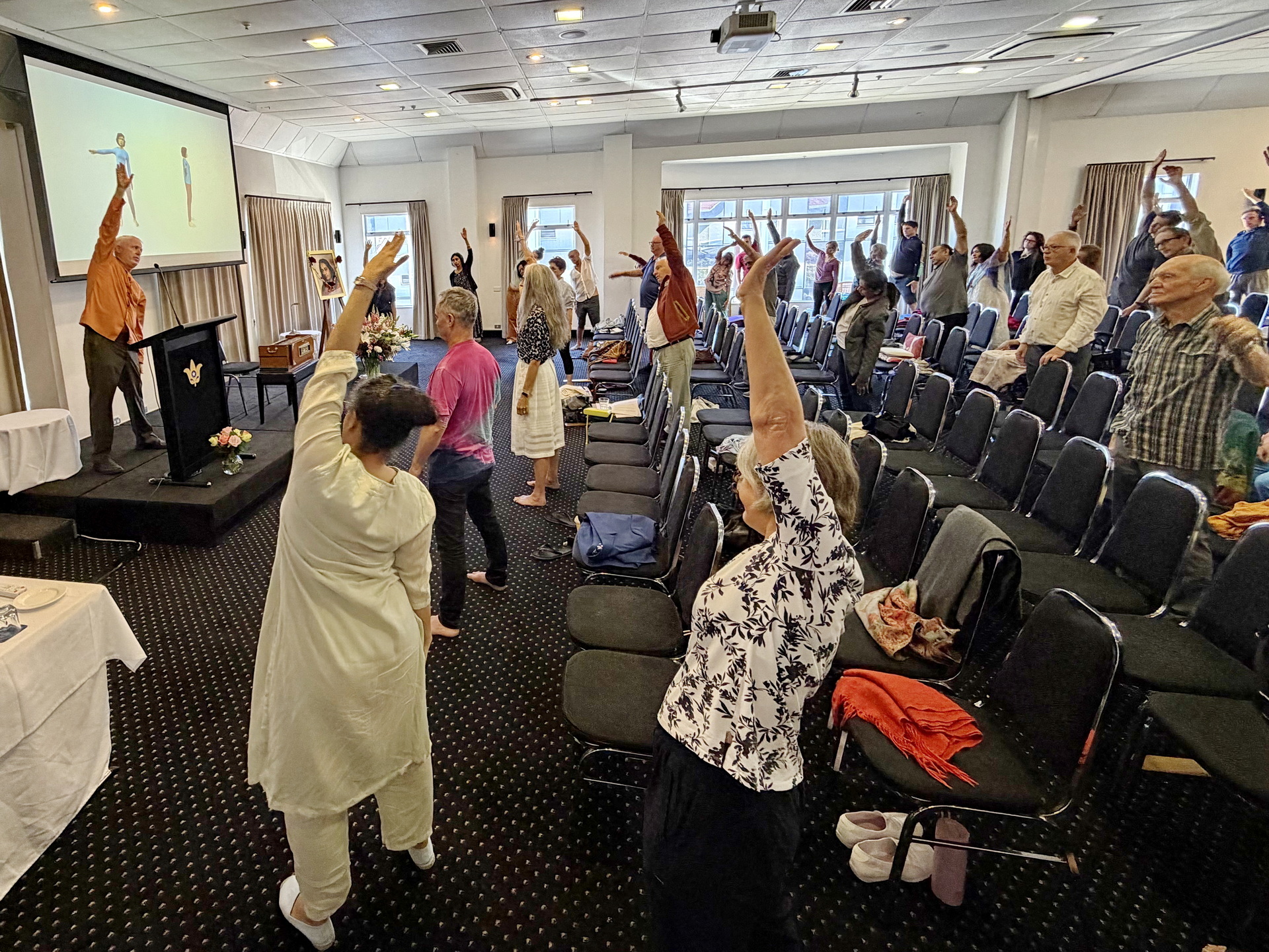 Brother Kartikananda led classes throughout the weekend, and here conducts a review of Paramahansa Yogananda's Energization Exercises.