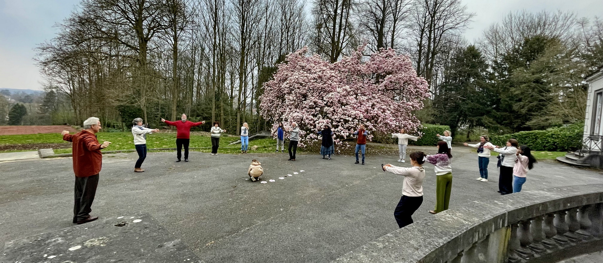 Brother Nikhilananda leads the practice of the Energization Exercises before group meditation with the Brussels Meditation Group.