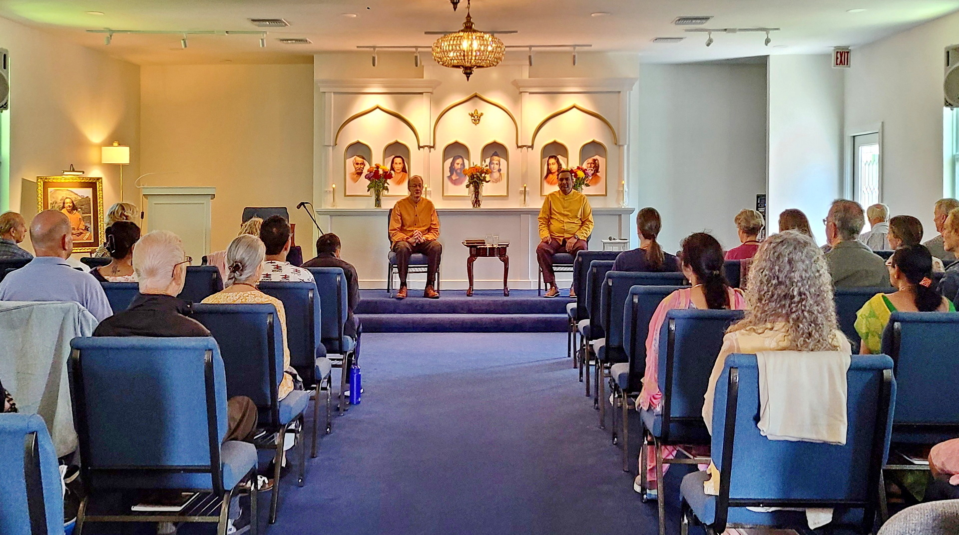 Brother Prafullananda and Brahmachari Bhaskarananda conduct a satsanga — answers to spiritual questions — in the new chapel.