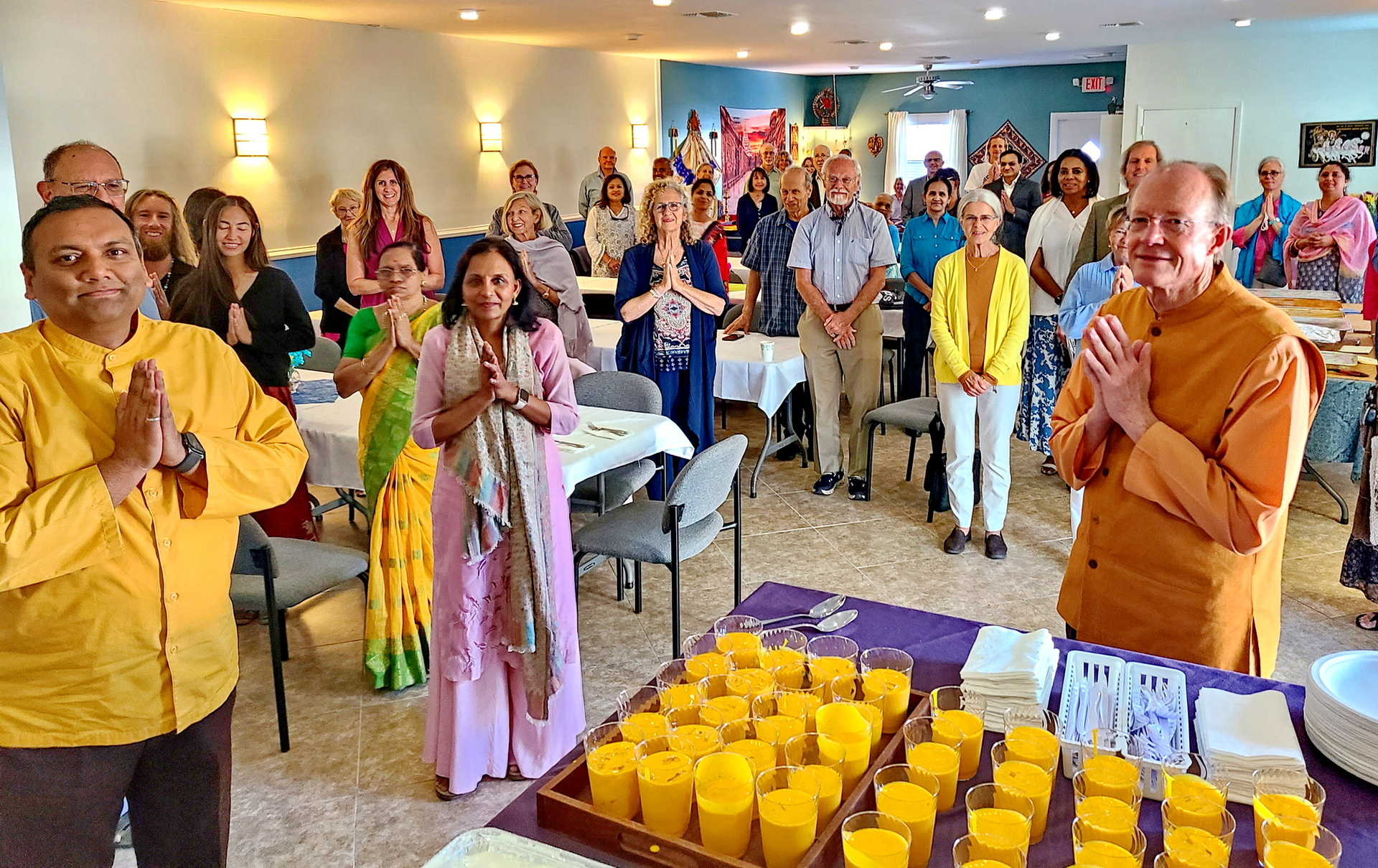 A special meal is served in the new social hall of the Tampa Meditation Group.
