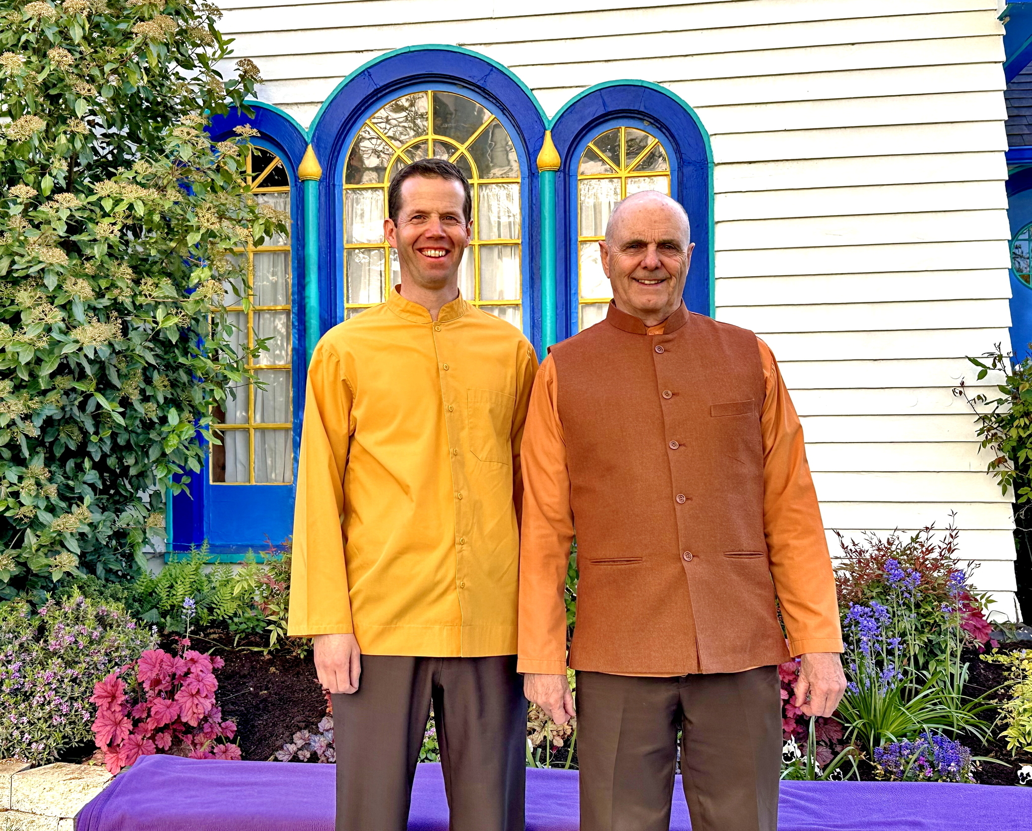 Brother Devananda and Brahmachari Ian in front of the Eugene Meditation Group's meeting place.
