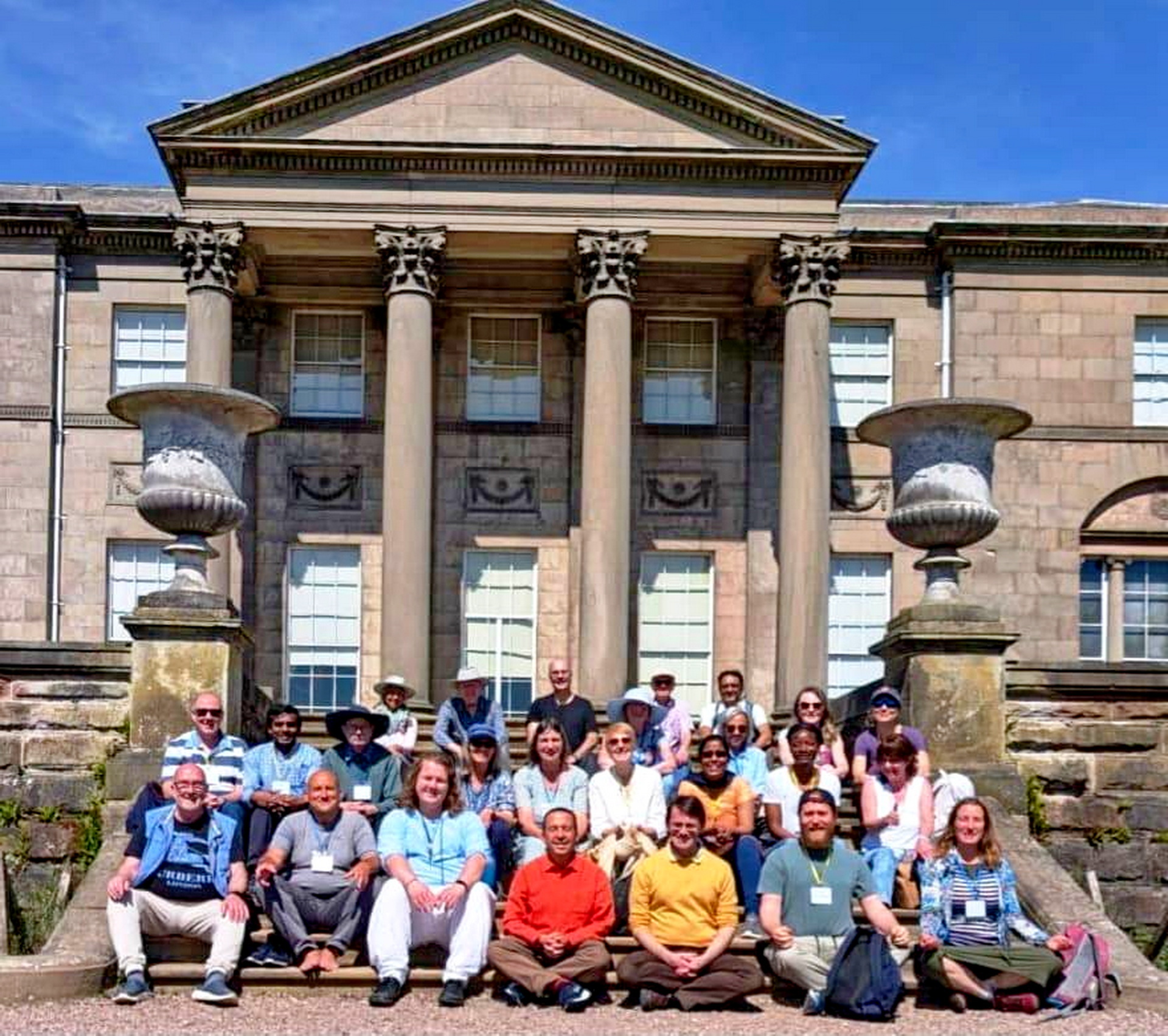Brother Sakhyananda and Brahmachari Daniel with Manchester devotees.