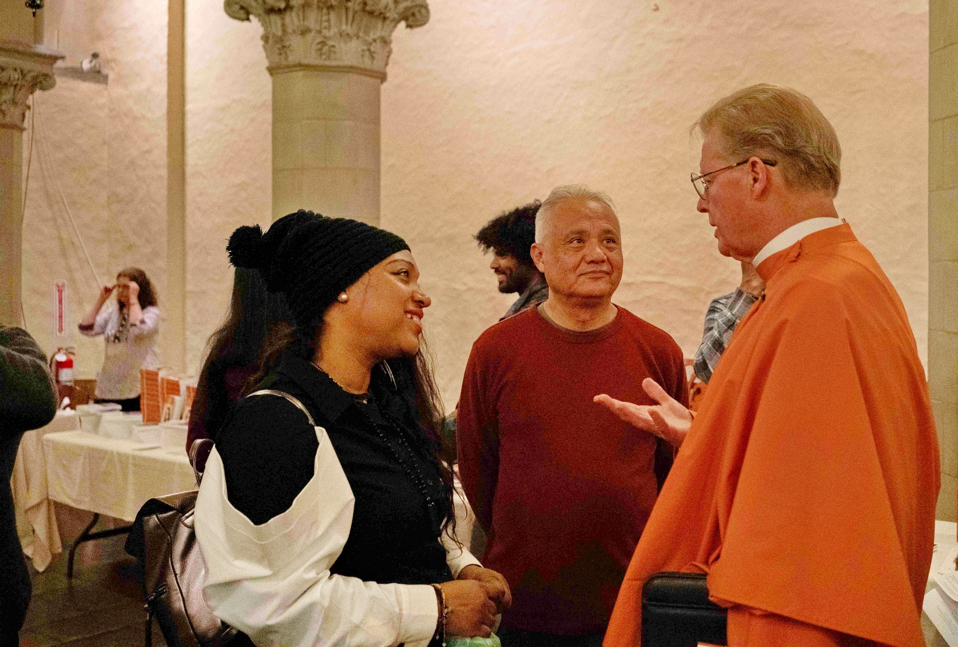 Brother Jayananda greeting attendees after the talk