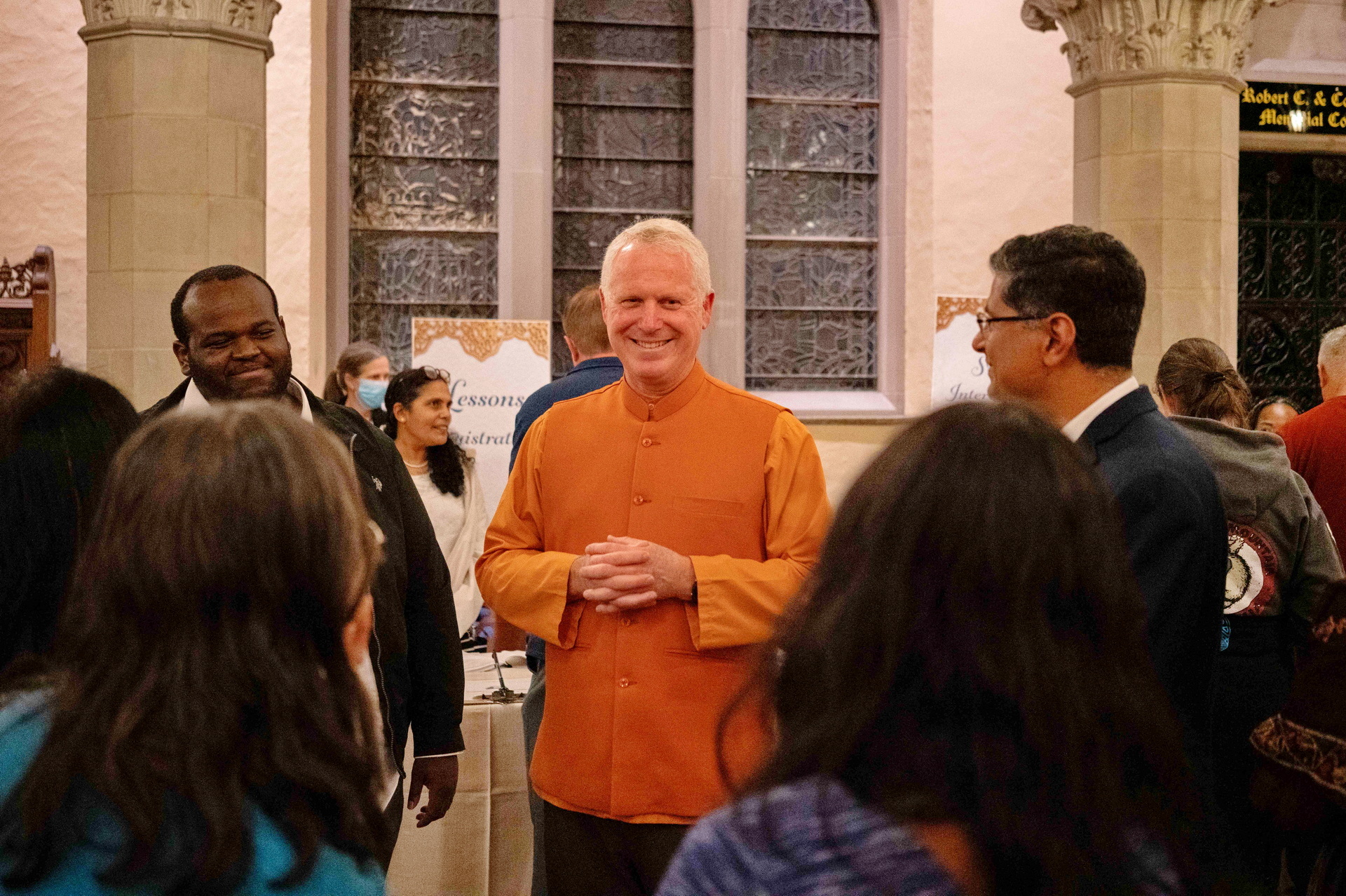 Brother Kartikananda speaks informally with members after the public lecture.