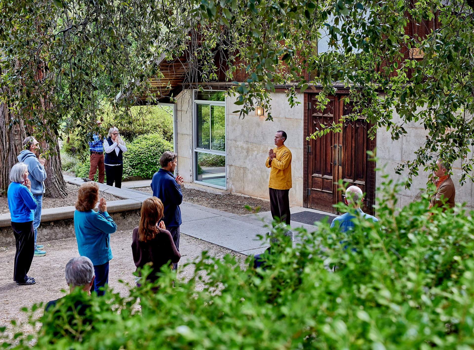 Brahmachari Preston conducts the practice of the Energization Exercises....