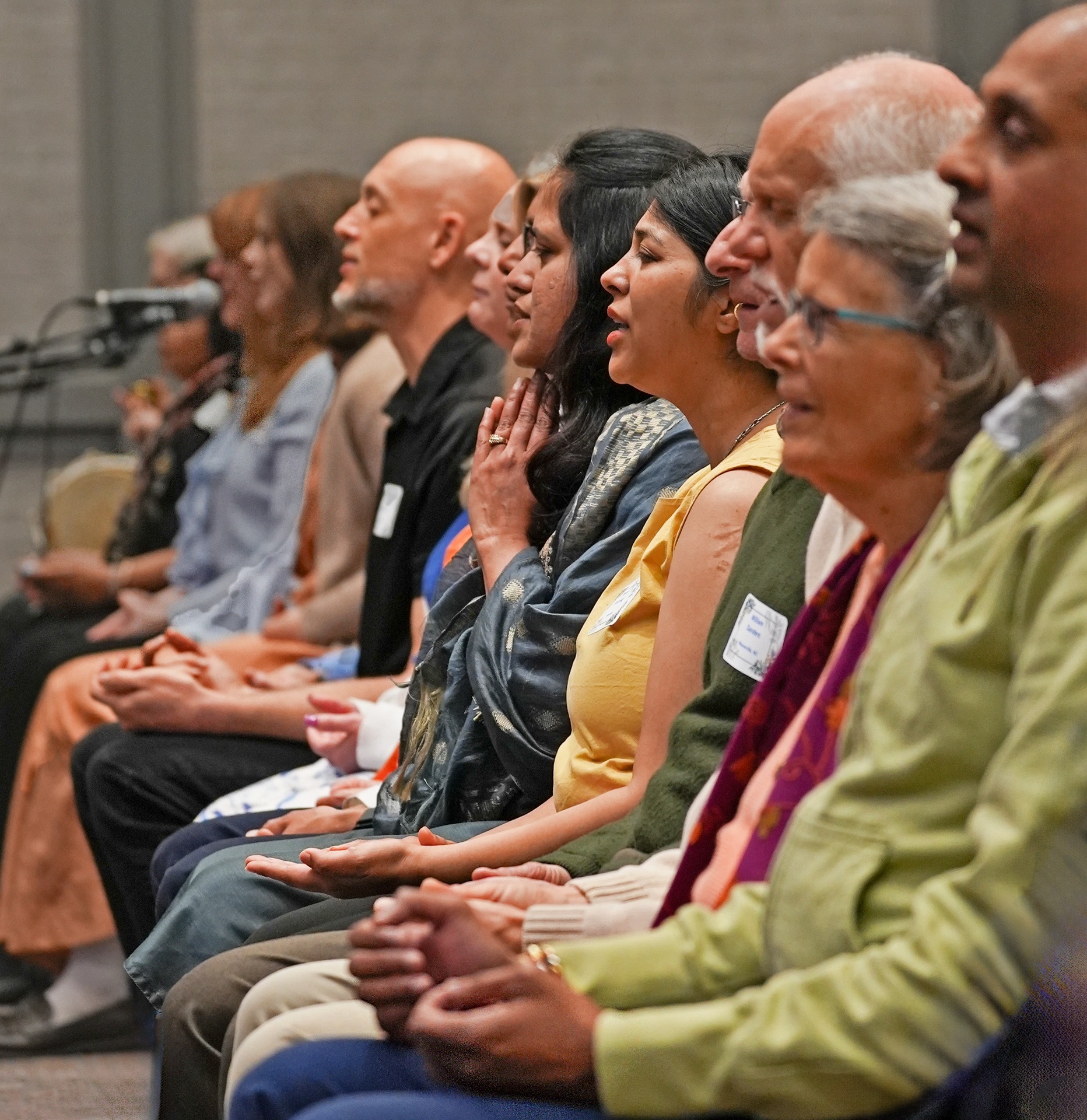 Participants devotionally chanting during the meditation