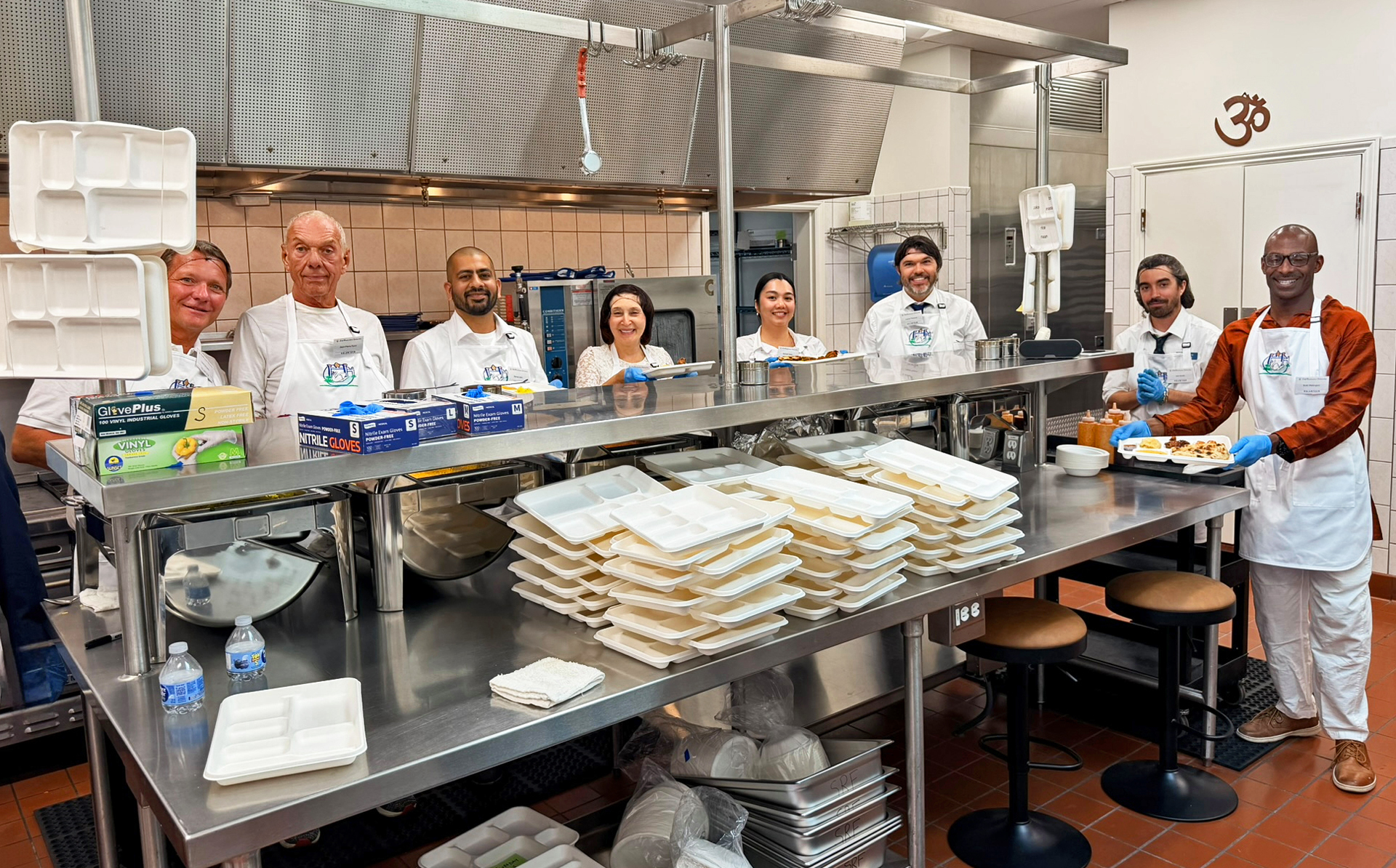 A dedicated group of volunteers prepare lunch for all the guests.