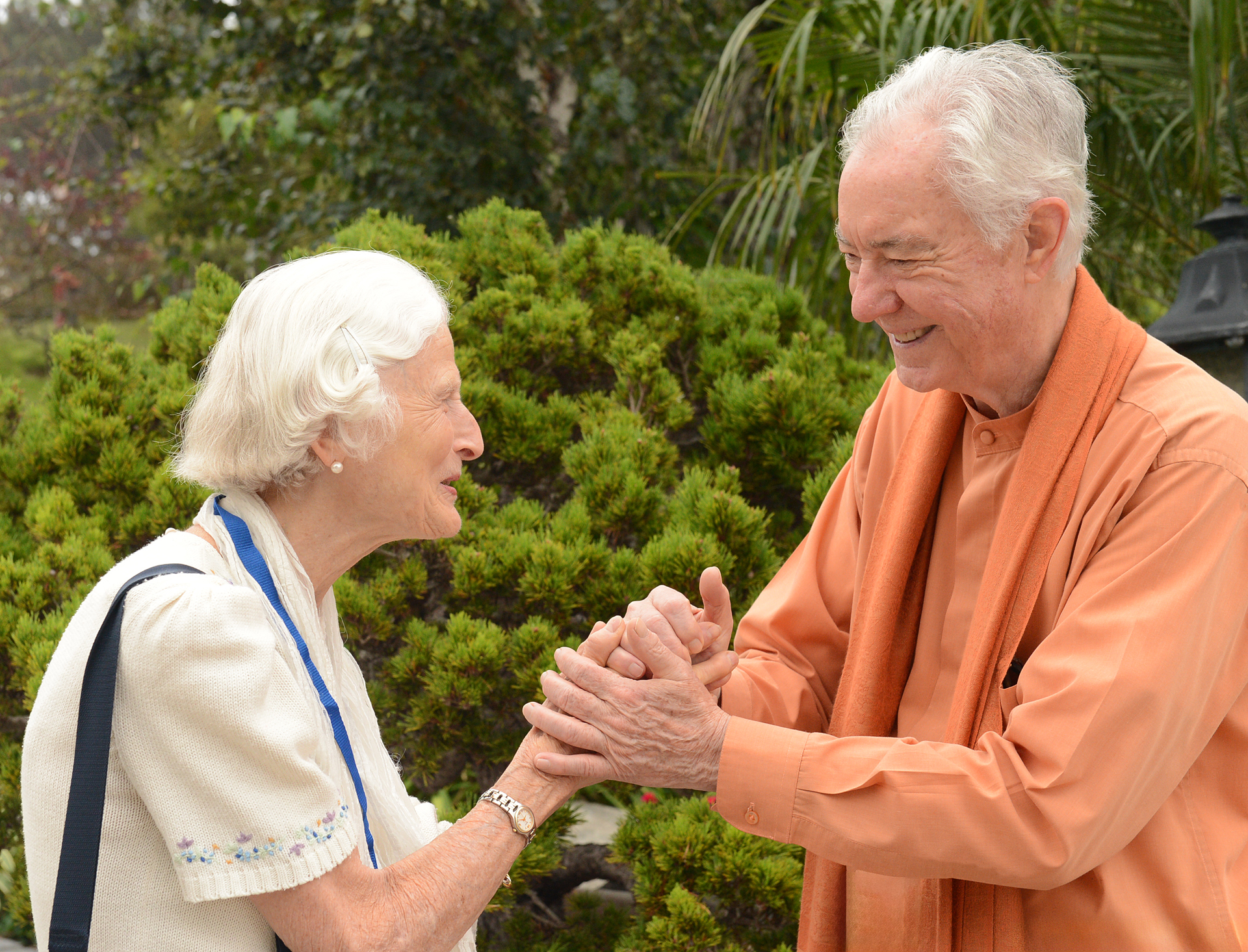 Brother Satyananda warmly greets a devotee.