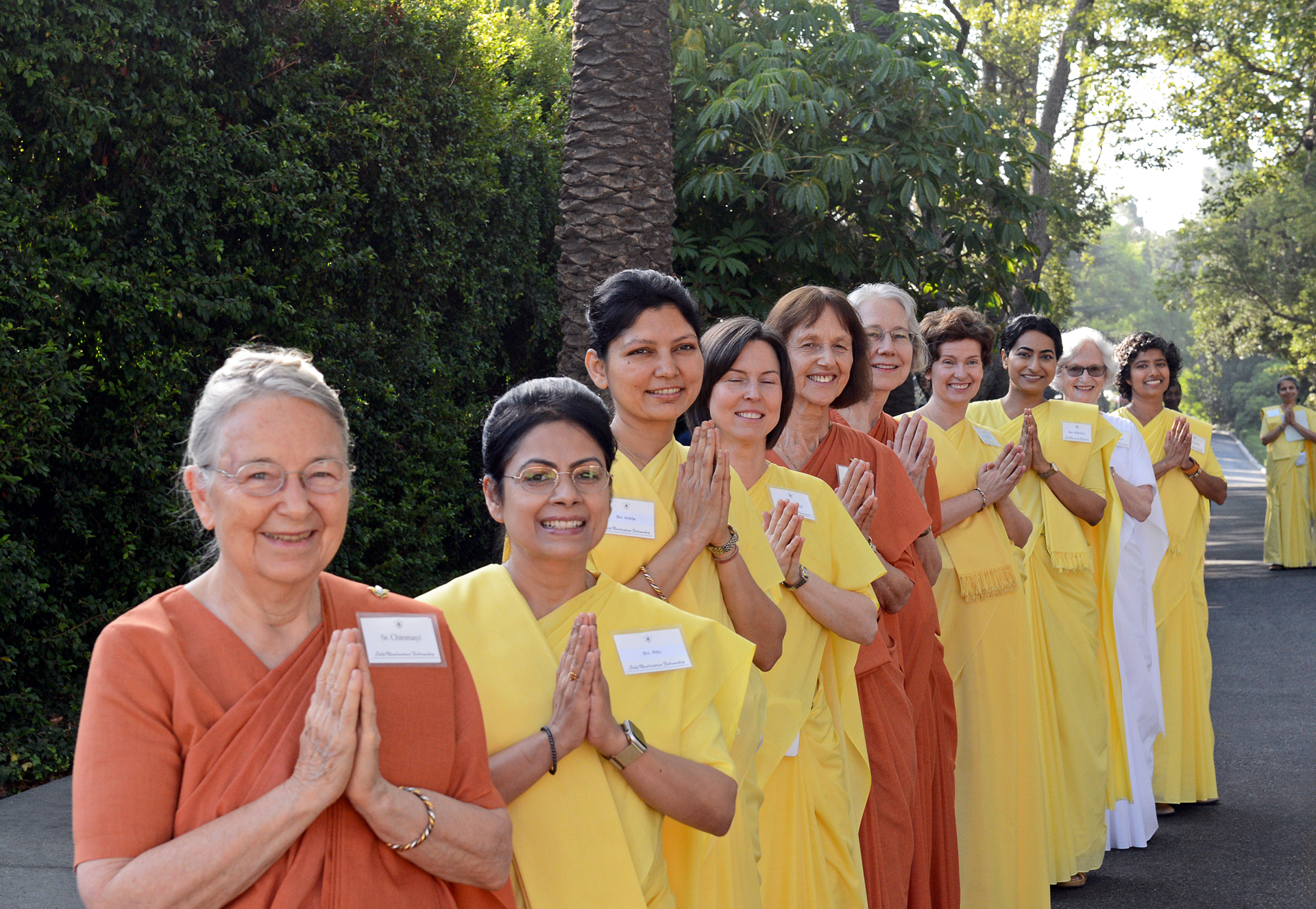 SRF nuns greet members as they enter the Mother Center grounds.