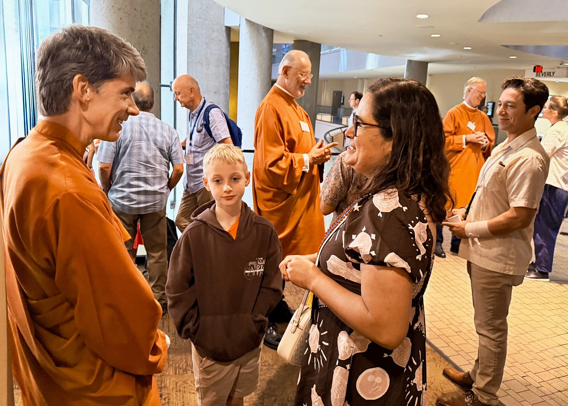Brother Dhruvananda greets devotees in a spirit of kindness.