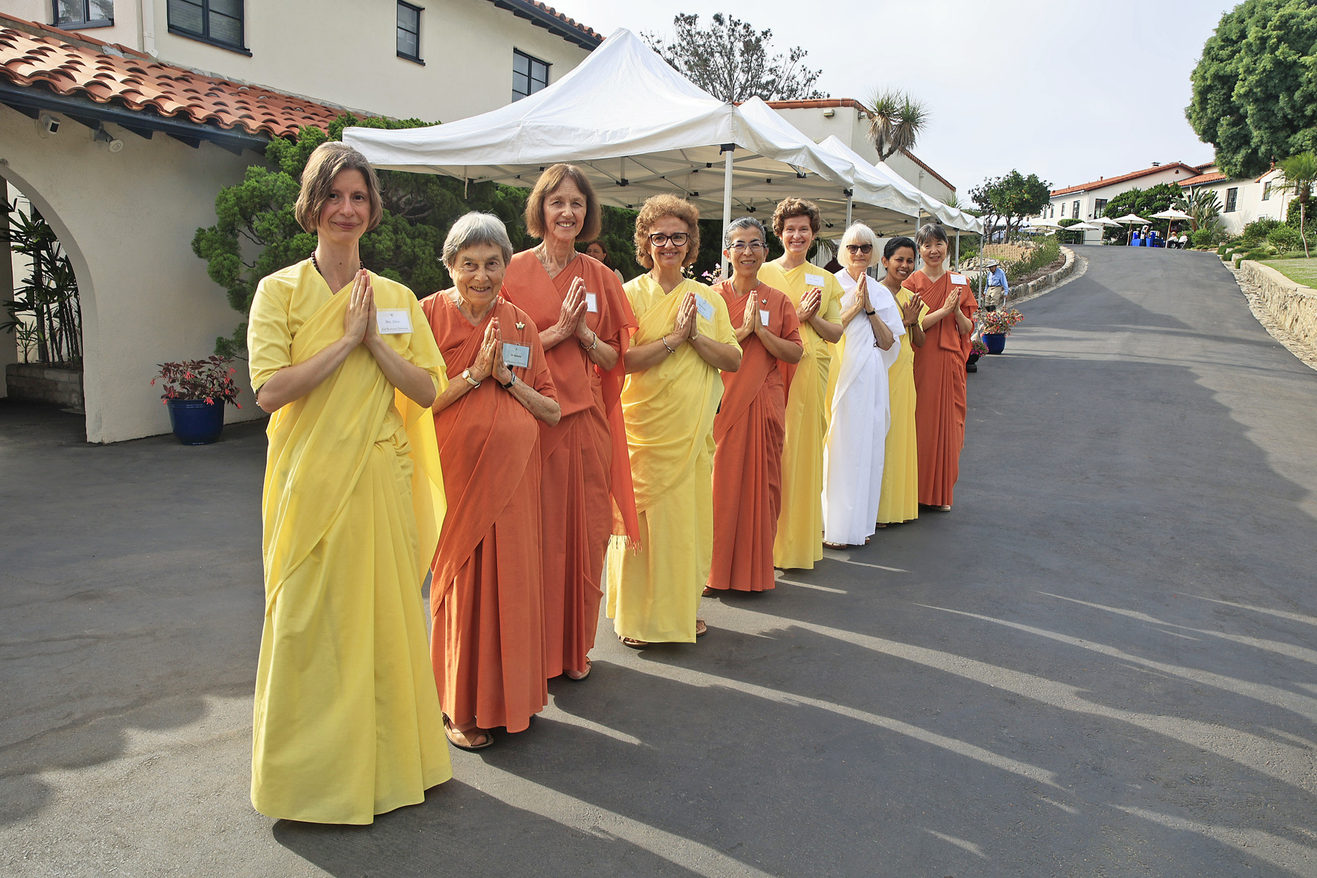 Pilgrimage participants are greeted by SRF nuns...