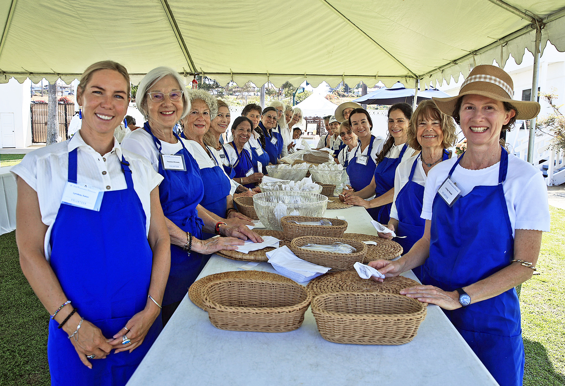 Volunteers joyously serve all.