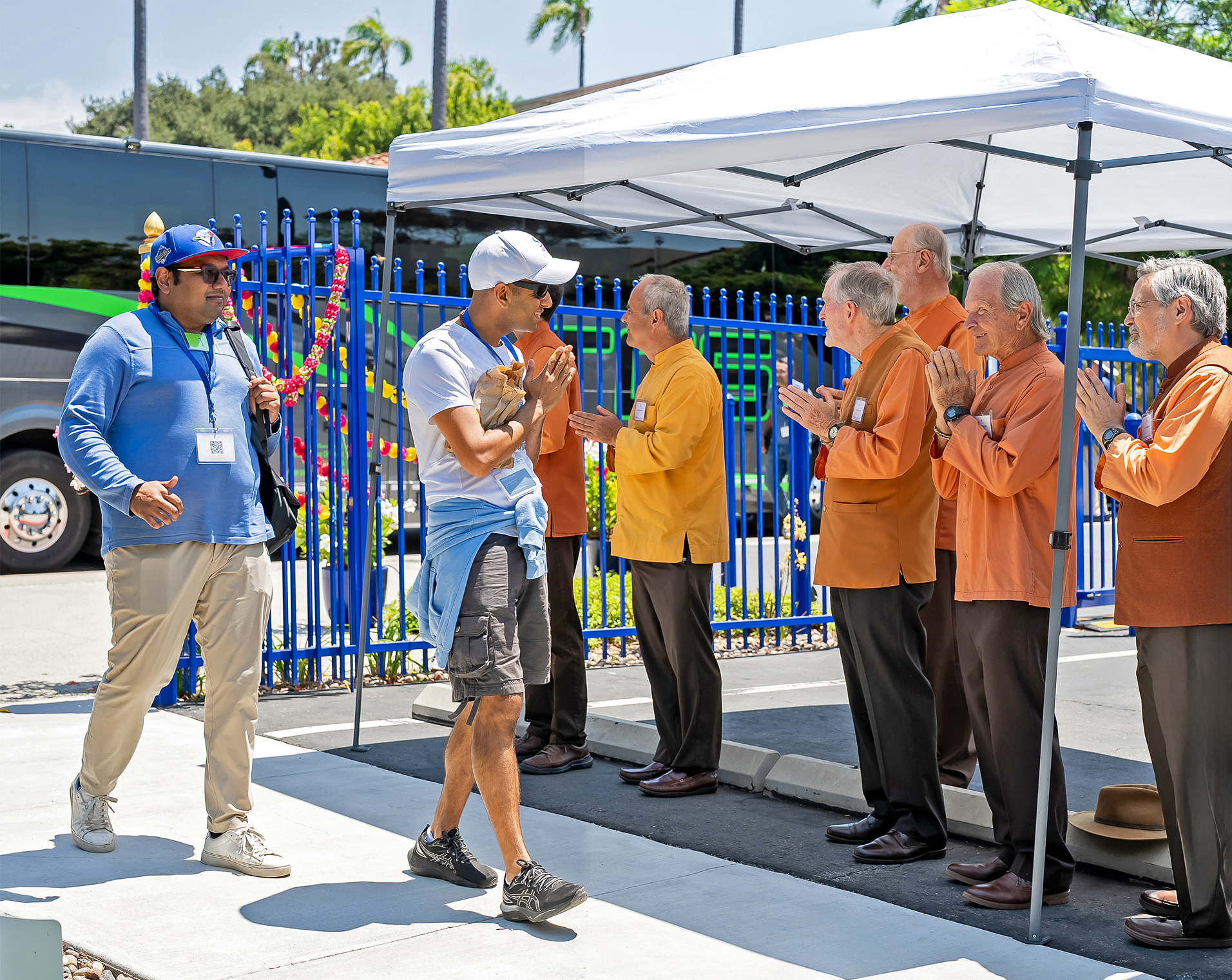 Brothers Naradananda, Kalyanananda, Jitananda, and Saralananda greet devotees...