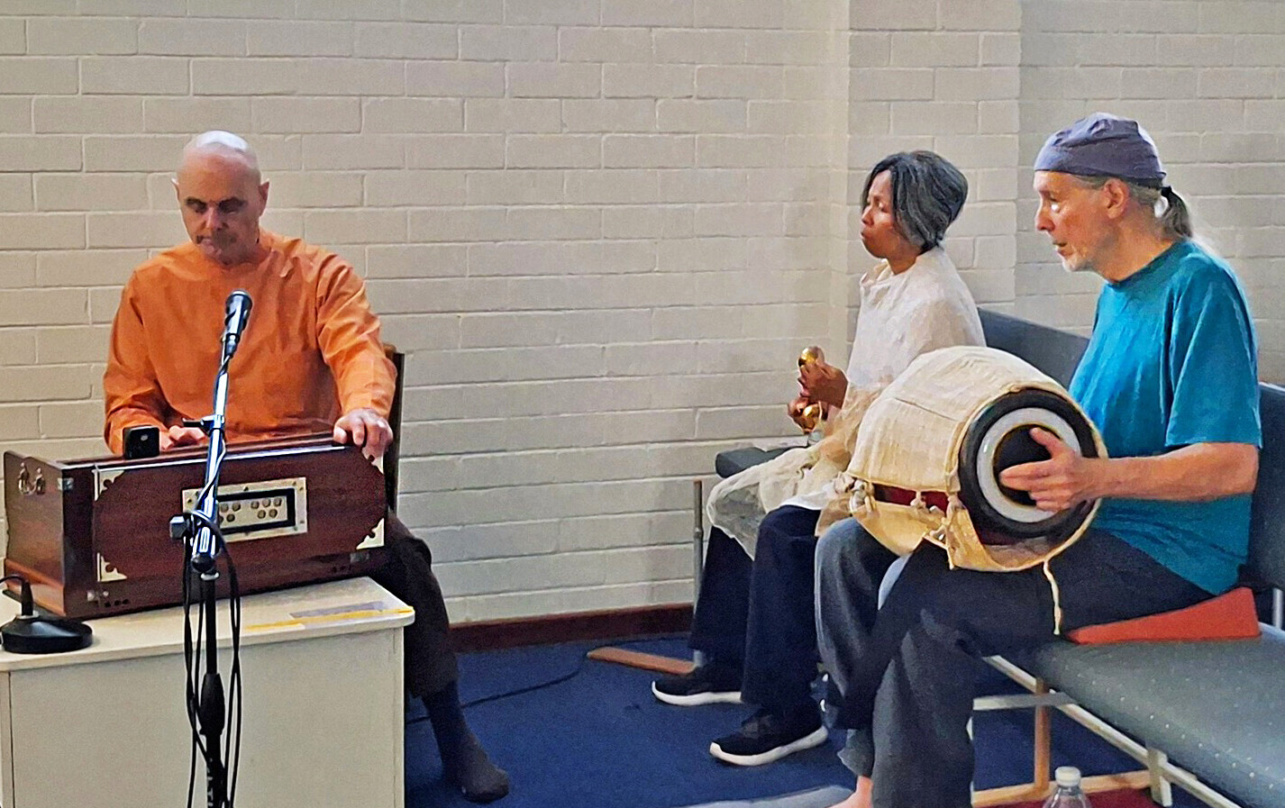 ...and Brother Devananda leads participants in devotional chanting.