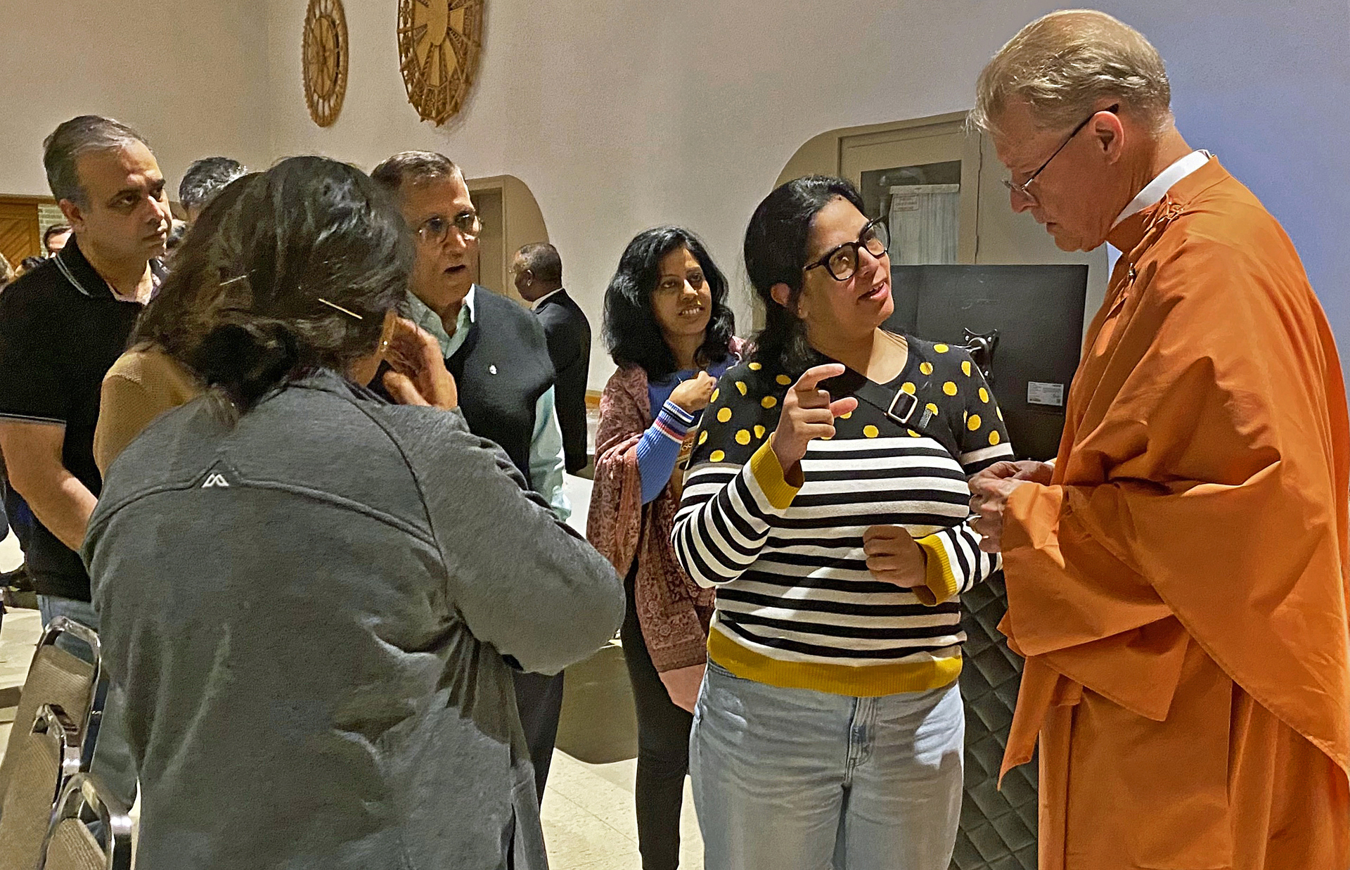 Brother Jayananda greets participants after the public lecture.
