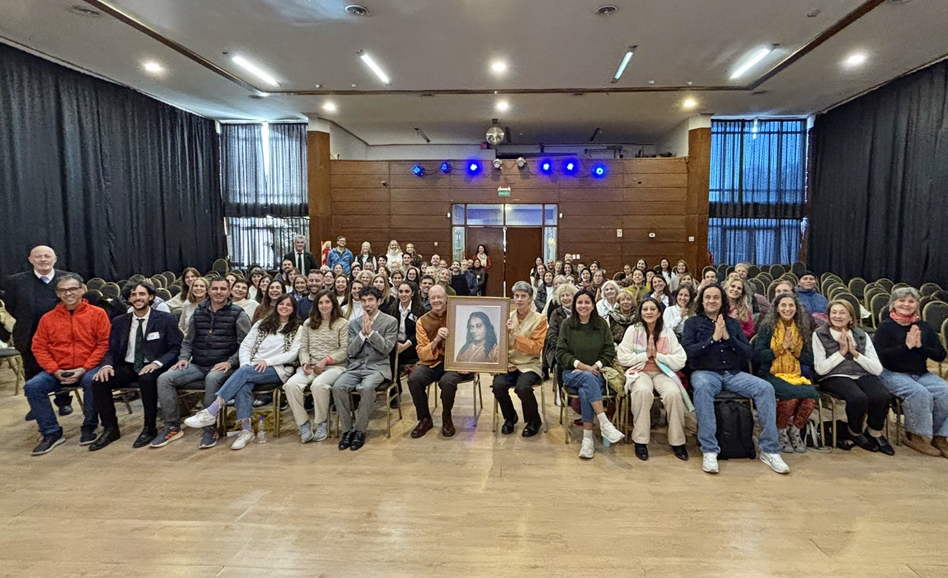 Brother Prafullananda and Brother Dhruvananda with attendees at the closing class in Cordoba.