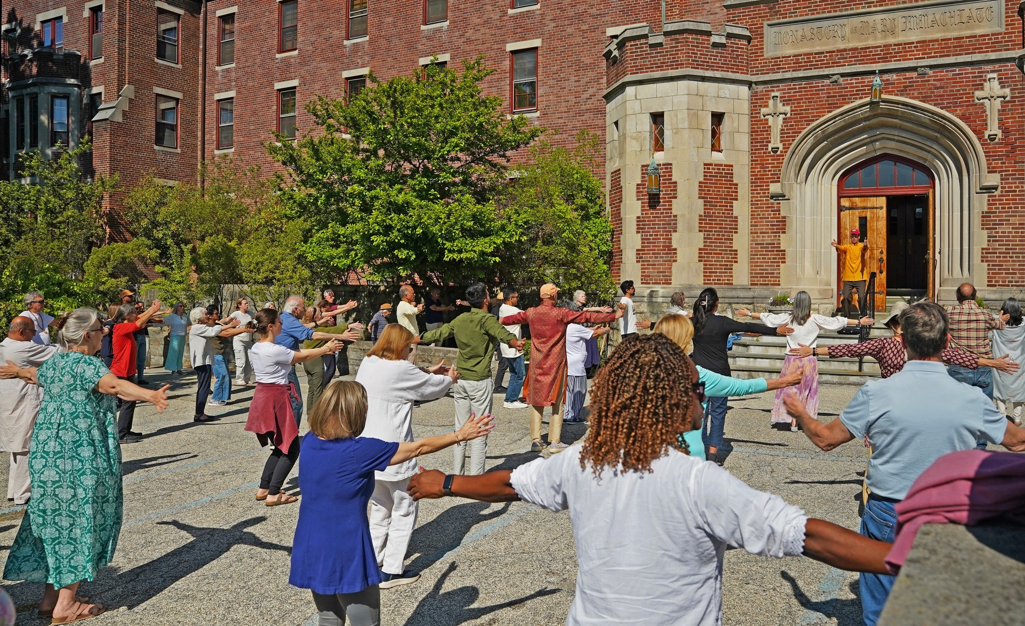 Brahmachari Ian conducts the practice of the Energization Exercises...