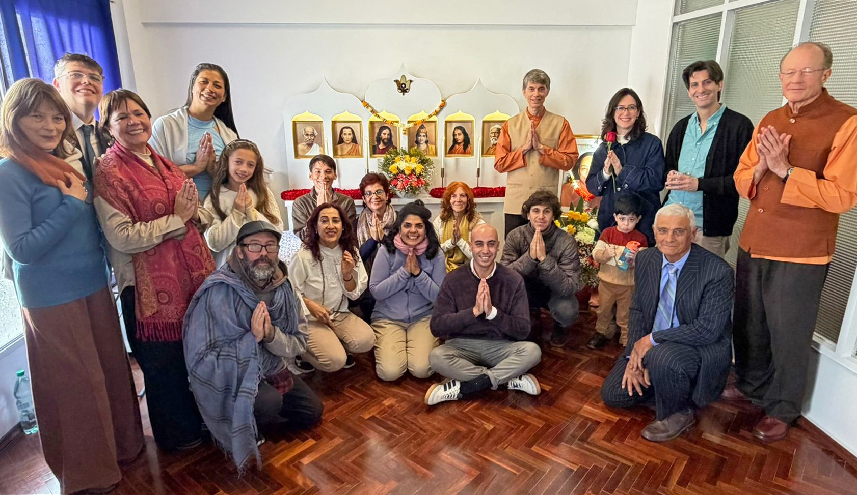 Brother Prafullananda and Brother Dhruvananda with Montevideo members.