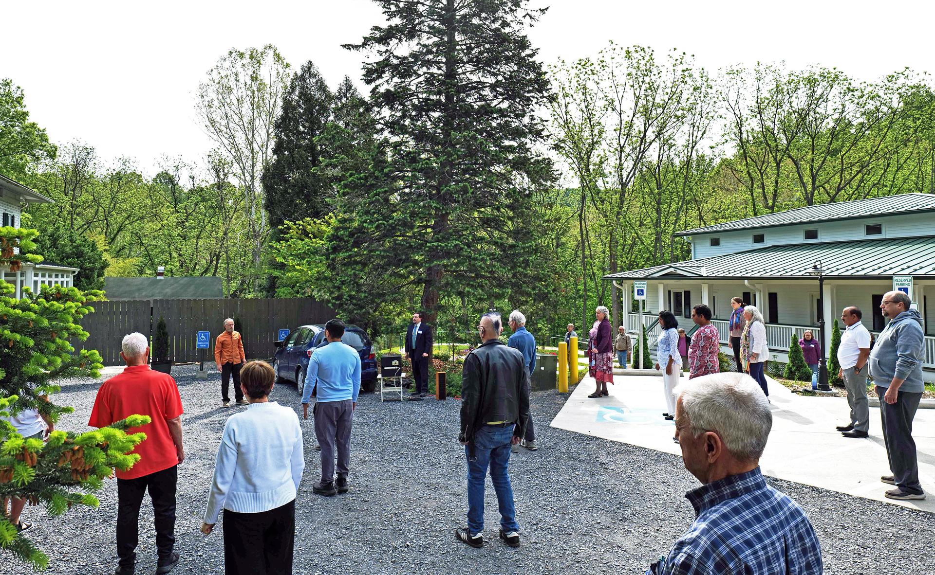 Brother Muktananda conducts the practice of the SRF Energization Exercises before a group meditation.