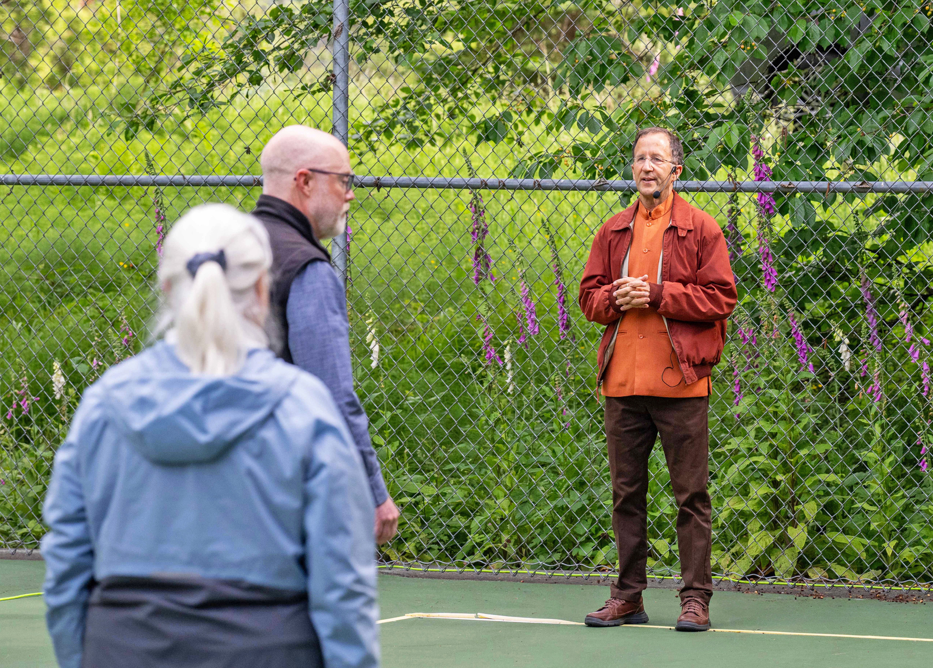 Brother Padmananda conducts the practice of Paramahansaji's Energization Exercises before a group meditation.