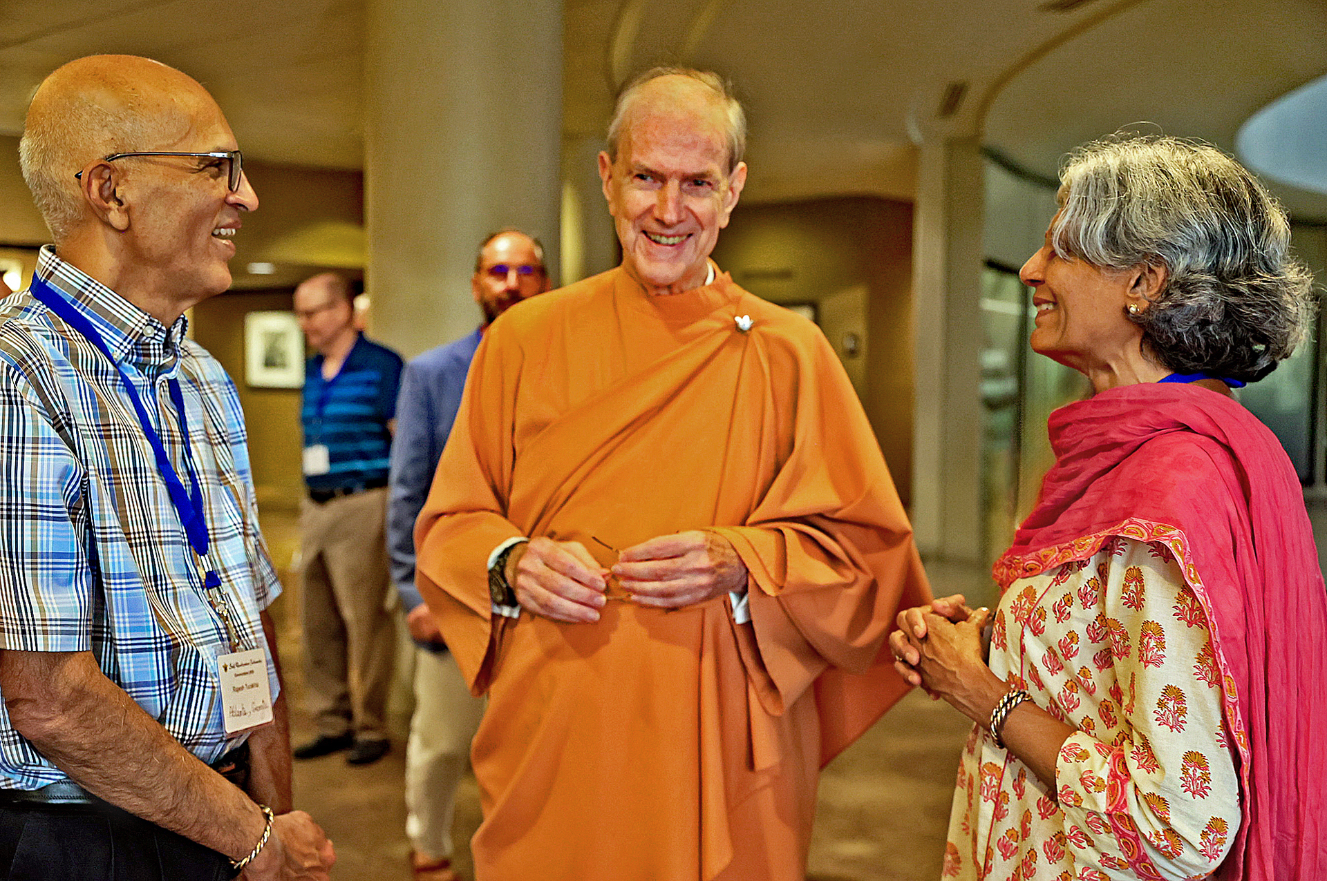 Brother Brahmananda sharing a warm moment with devotees.