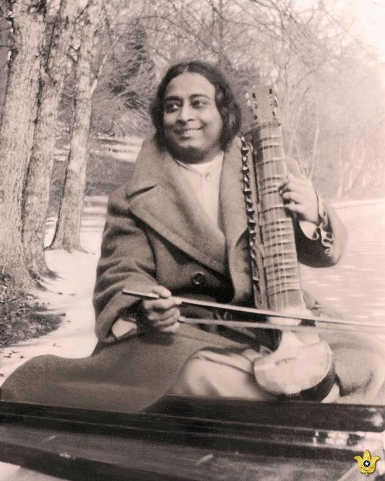 paramahansa yogananda playing esraj wilderness 1927 with gold lotus
