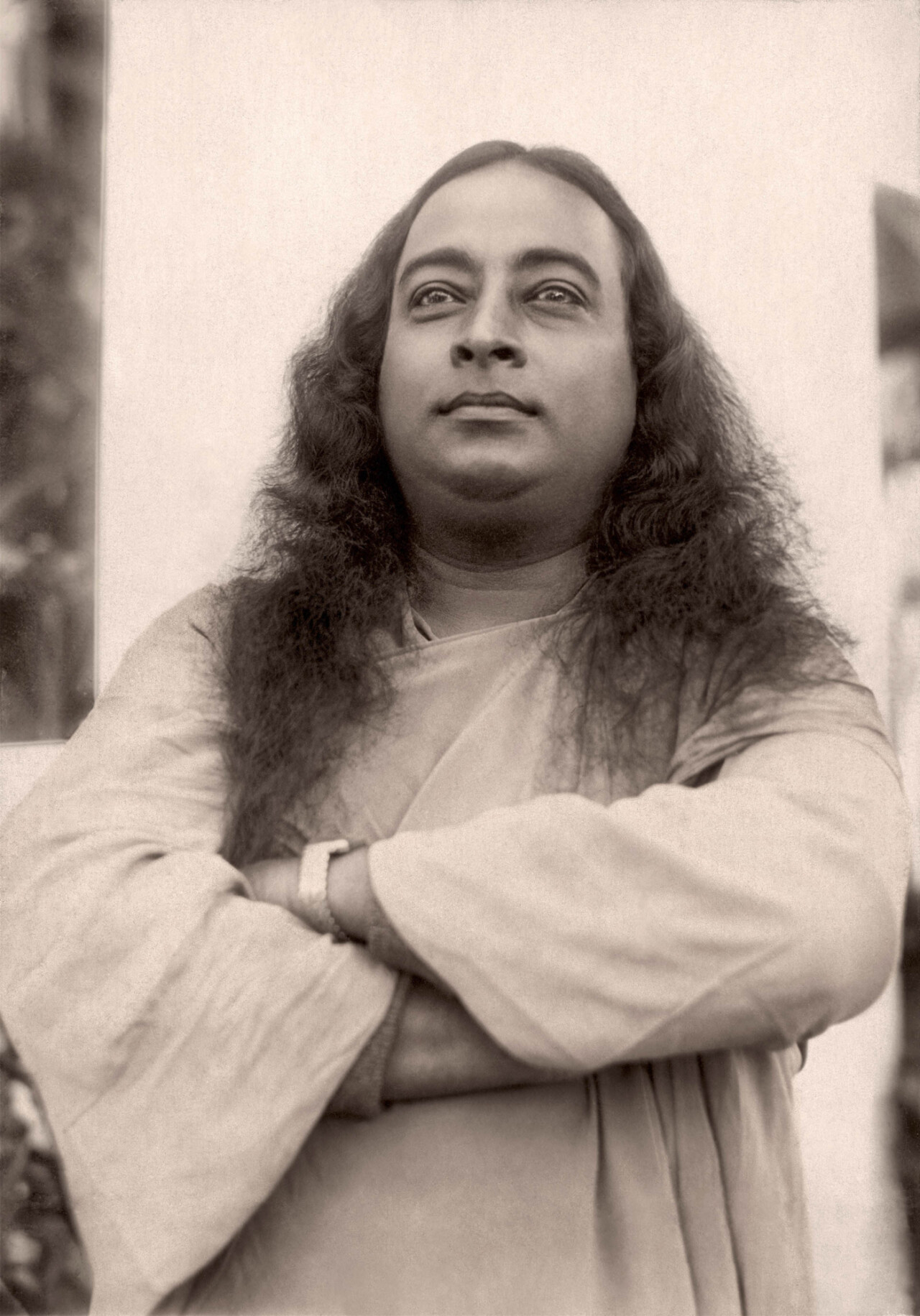 Yogananda standing with arms crossed sepia 07062022