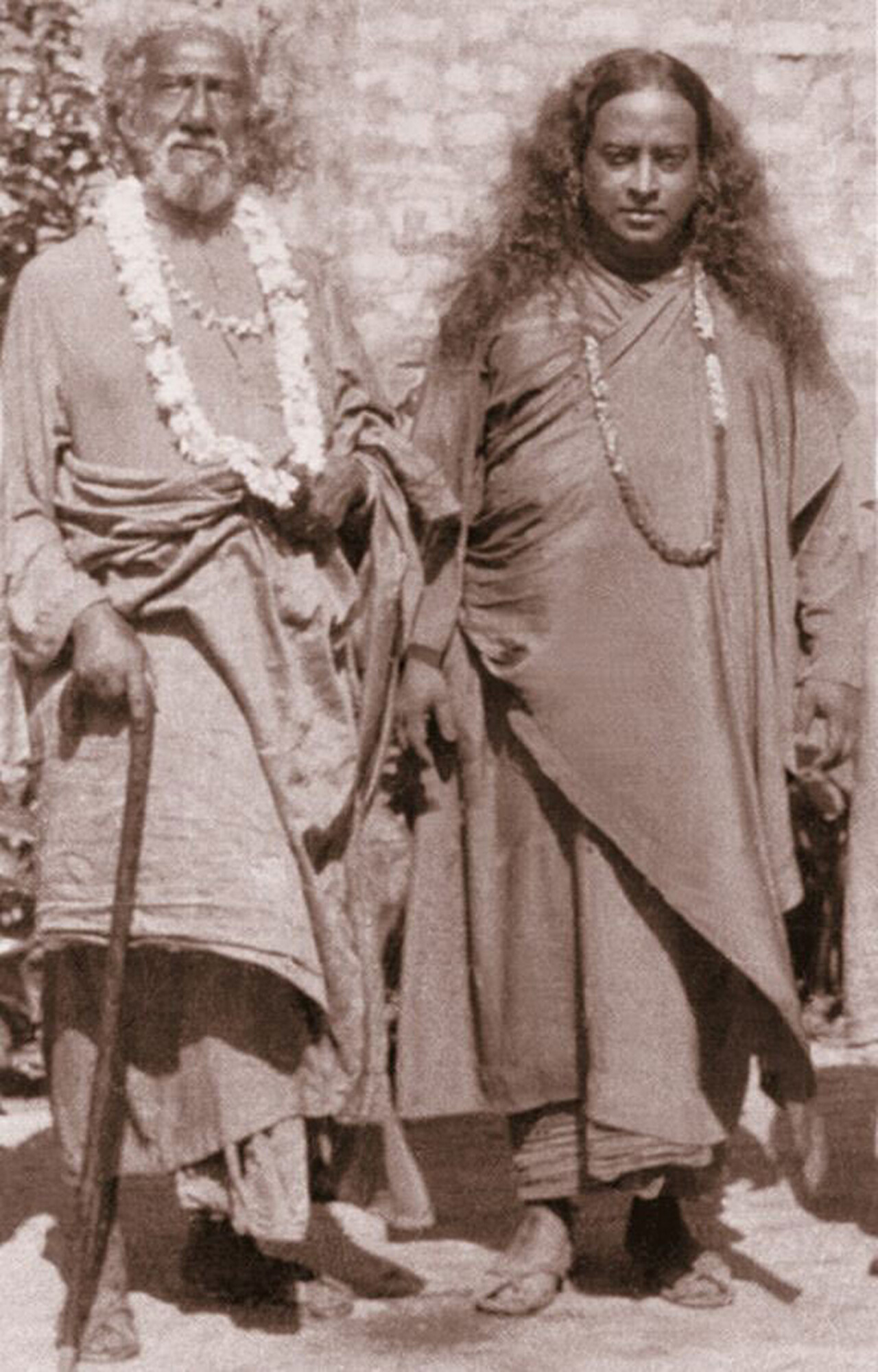 Swami Sri Yukteswar and Paramahansa Yogananda standing together