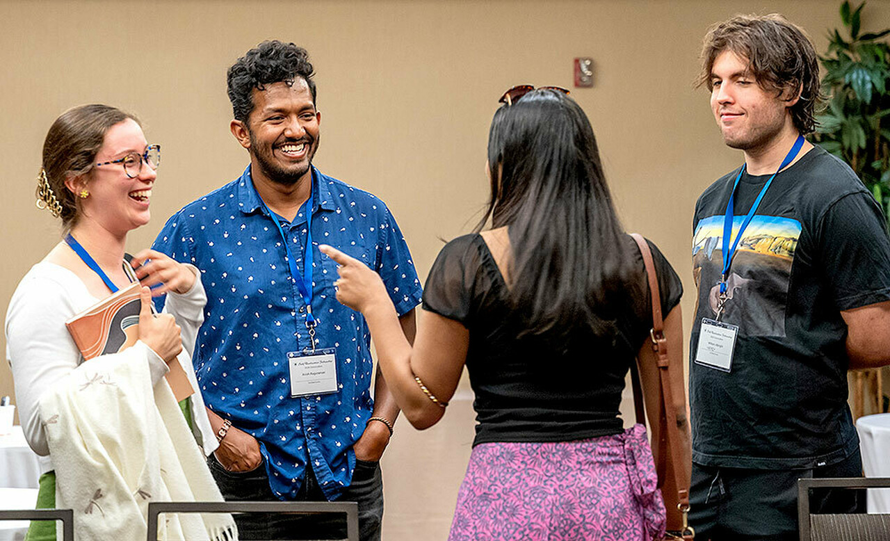 Young adults devotees laughing
