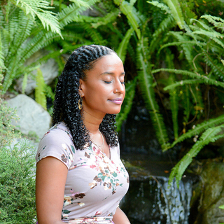 SRF Devotee Meditating in Garden