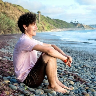 Man sitting on the beach