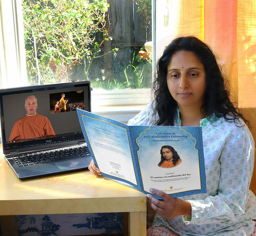 Young Woman Reading Spanish Lessons at desk square